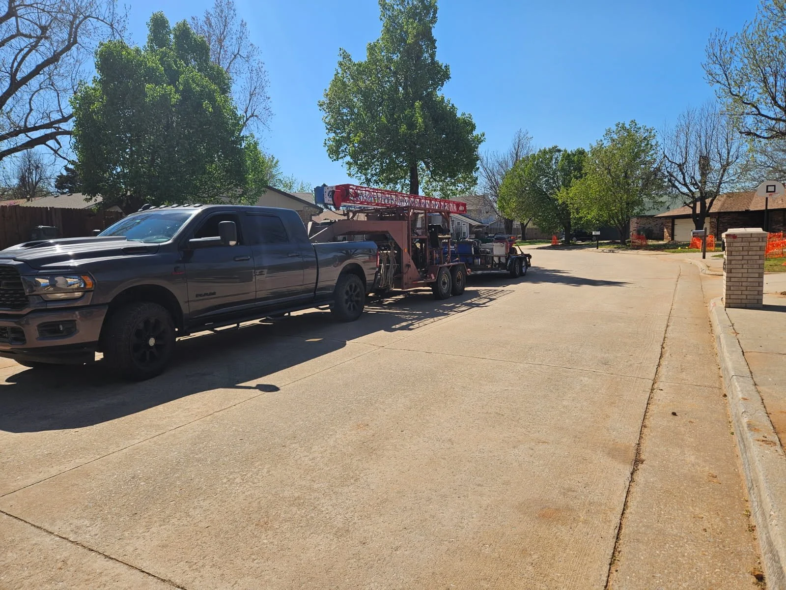 Green Country Tower Service LLC hoist, truck, and gin pole setup for a broadcast tower construction project. Specialized tower rigging, equipment deployment, and communications infrastructure support by our experienced tower crew.