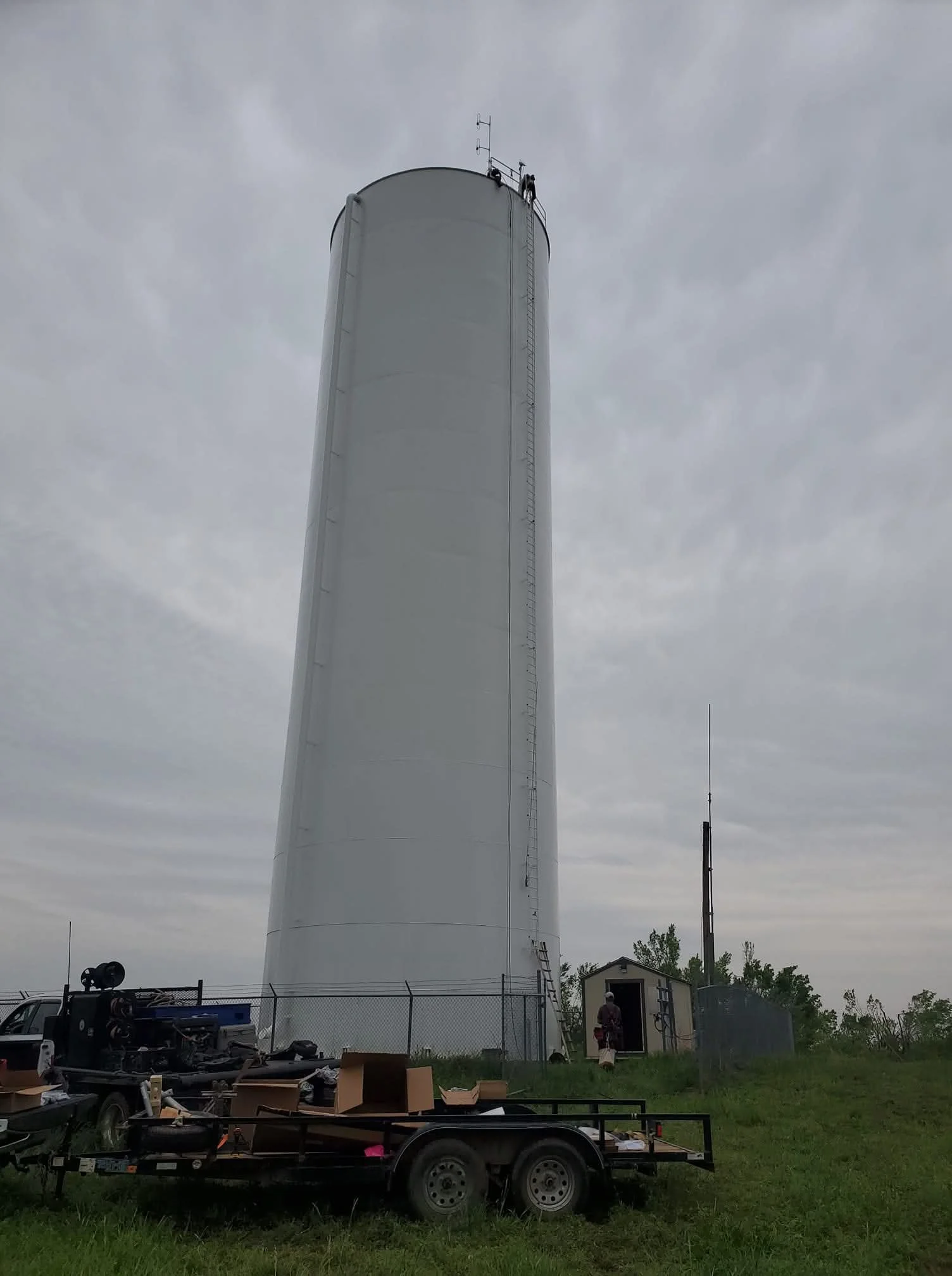 Emergency communications tower installation on a municipal water tank in Newcastle, Oklahoma. Green Country Tower Service provides public safety communications infrastructure, equipment installation, inspections, and tower services nationwide.