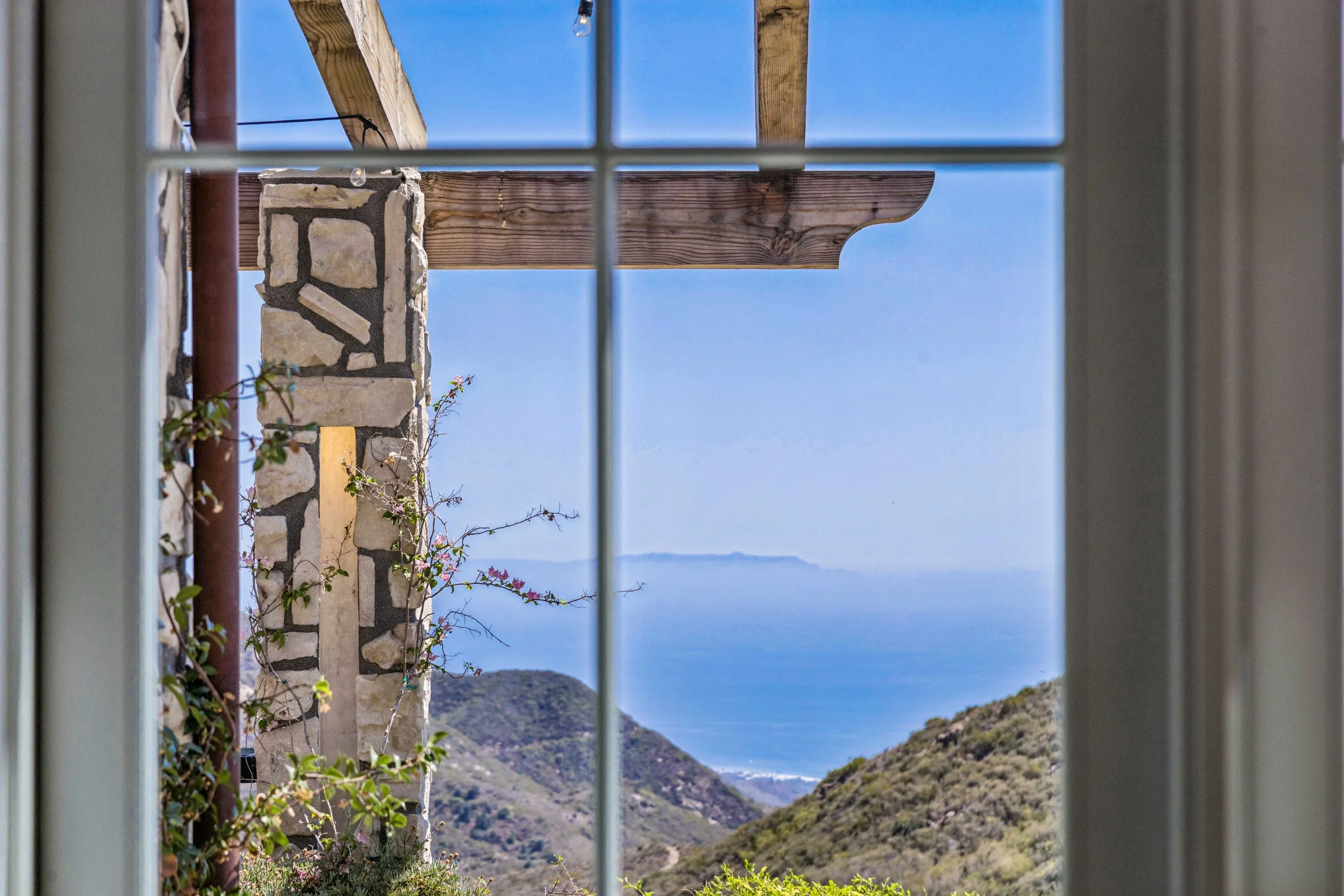 malibu-mediterranean-villa-ocean-view-reclaimed-beams.jpg