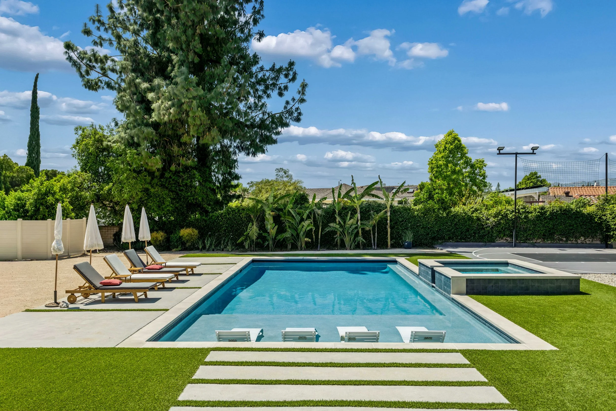 northridge-luxury-home-pool-chaise-lounge-real-estate.jpg