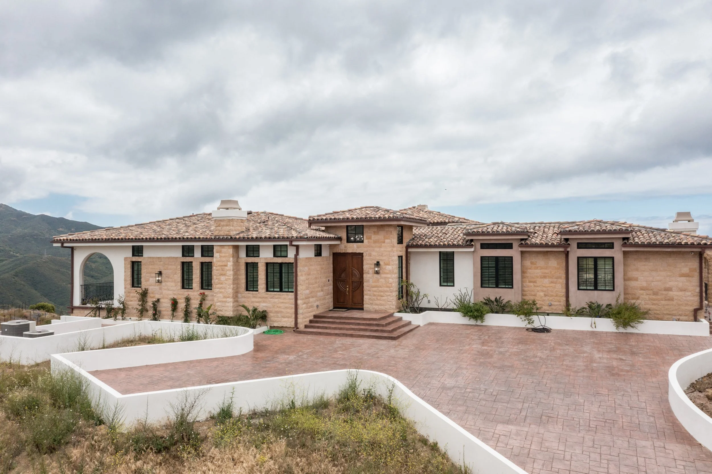 malibu-mediterranean-estate-front-exterior-real-estate.jpg
