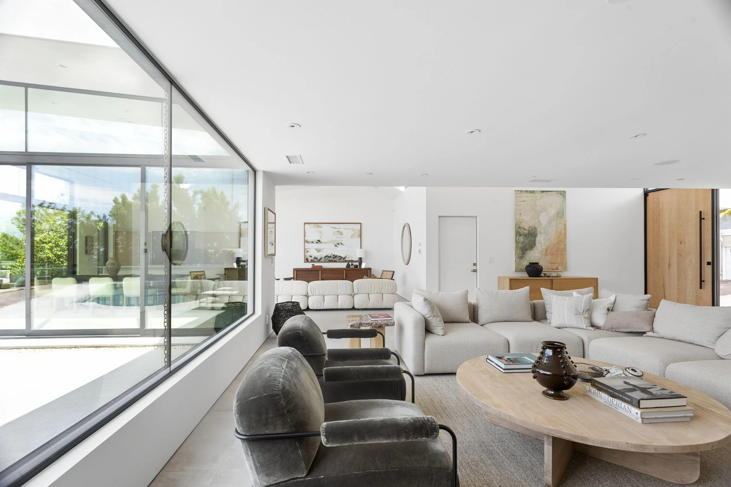 studio-city-modern-home-great-room-walls-of-glass.jpg
