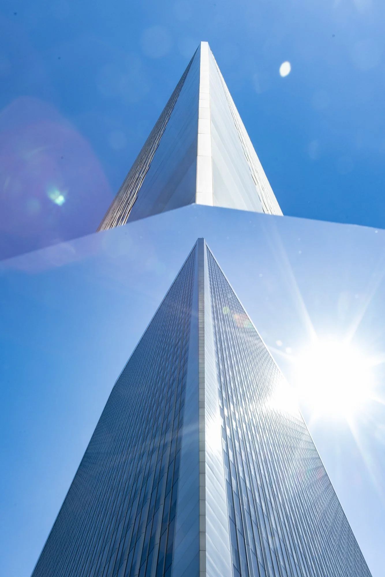 18-triangular-tower-sun-flare-establishing-shot-century-city-los-angeles-linda-kasian.jpg