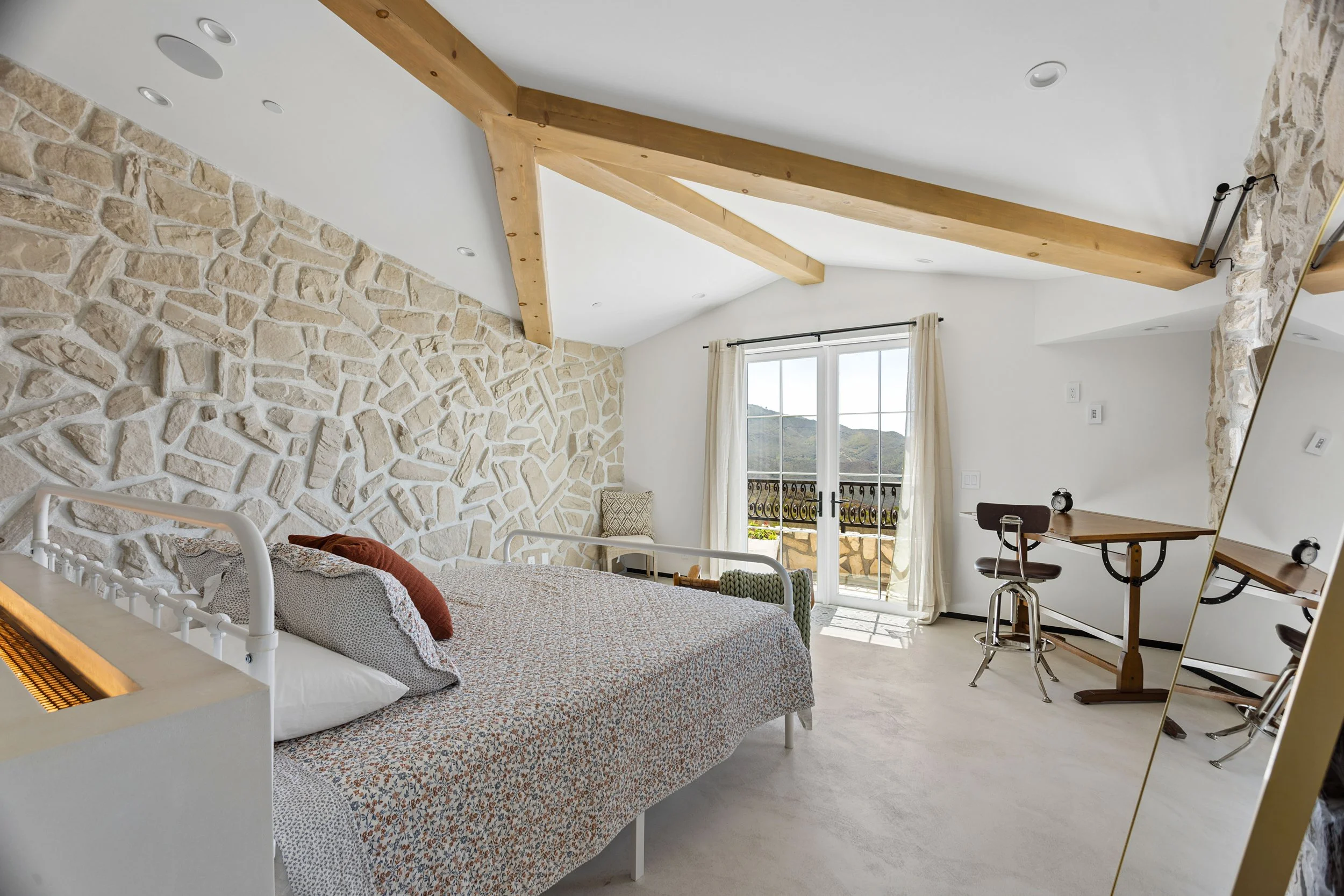 malibu-mediterranean-villa-bedroom-arched-door-view.jpg