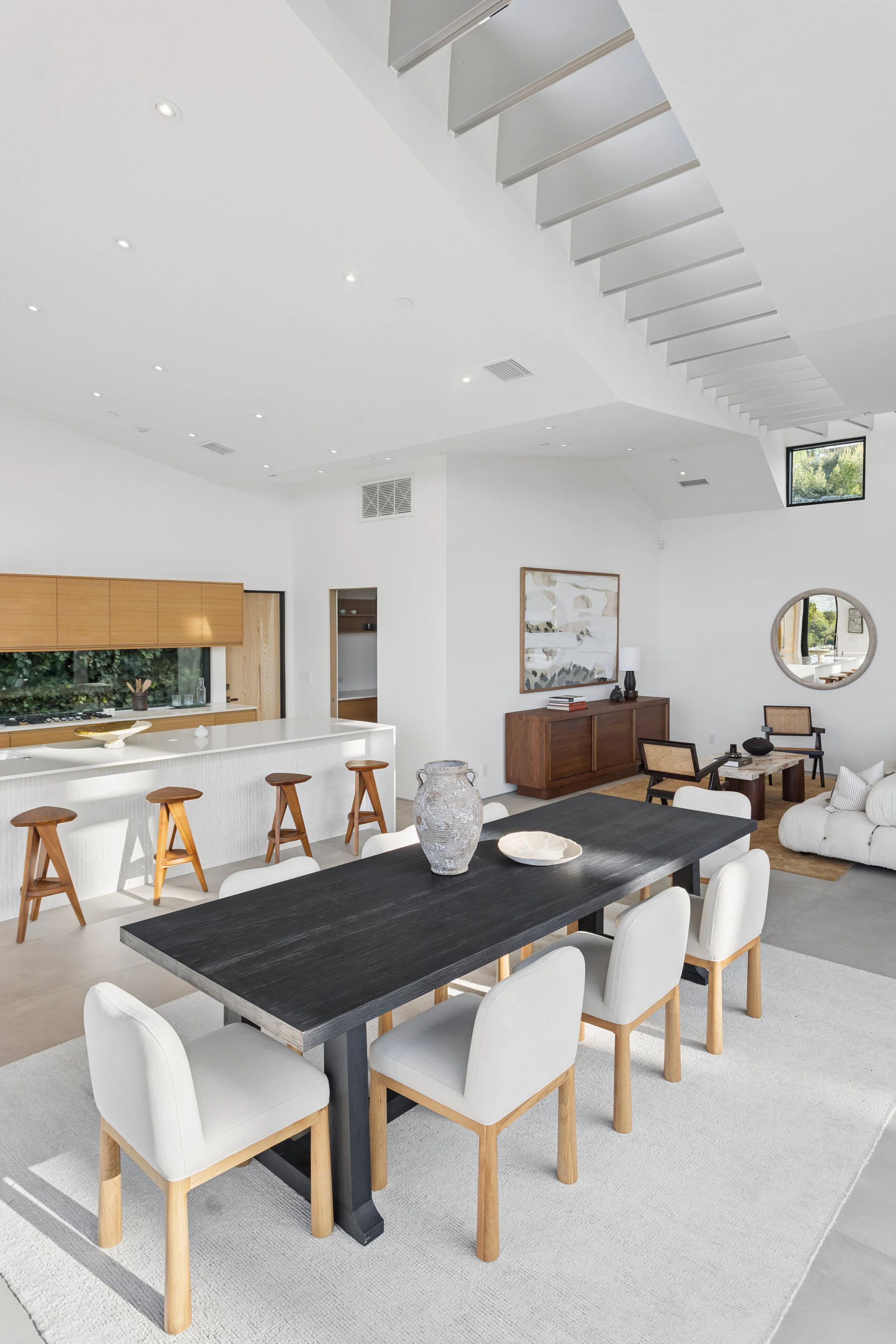 studio-city-modern-home-dining-black-table-kitchen.jpg