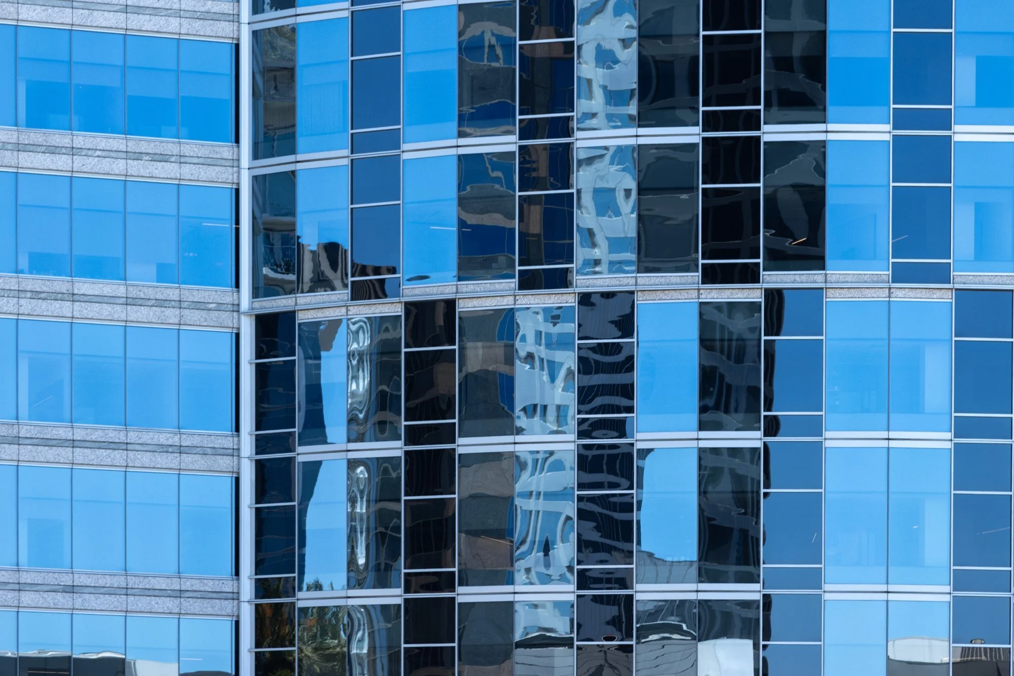 17-glass-facade-rippling-vertical-reflection-column-century-city-los-angeles-linda-kasian.jpg