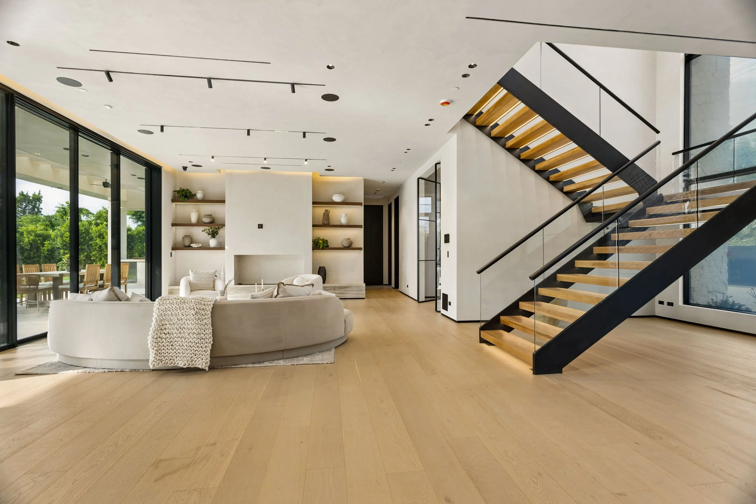 encino-modern-home-great-room-floating-staircase.jpg