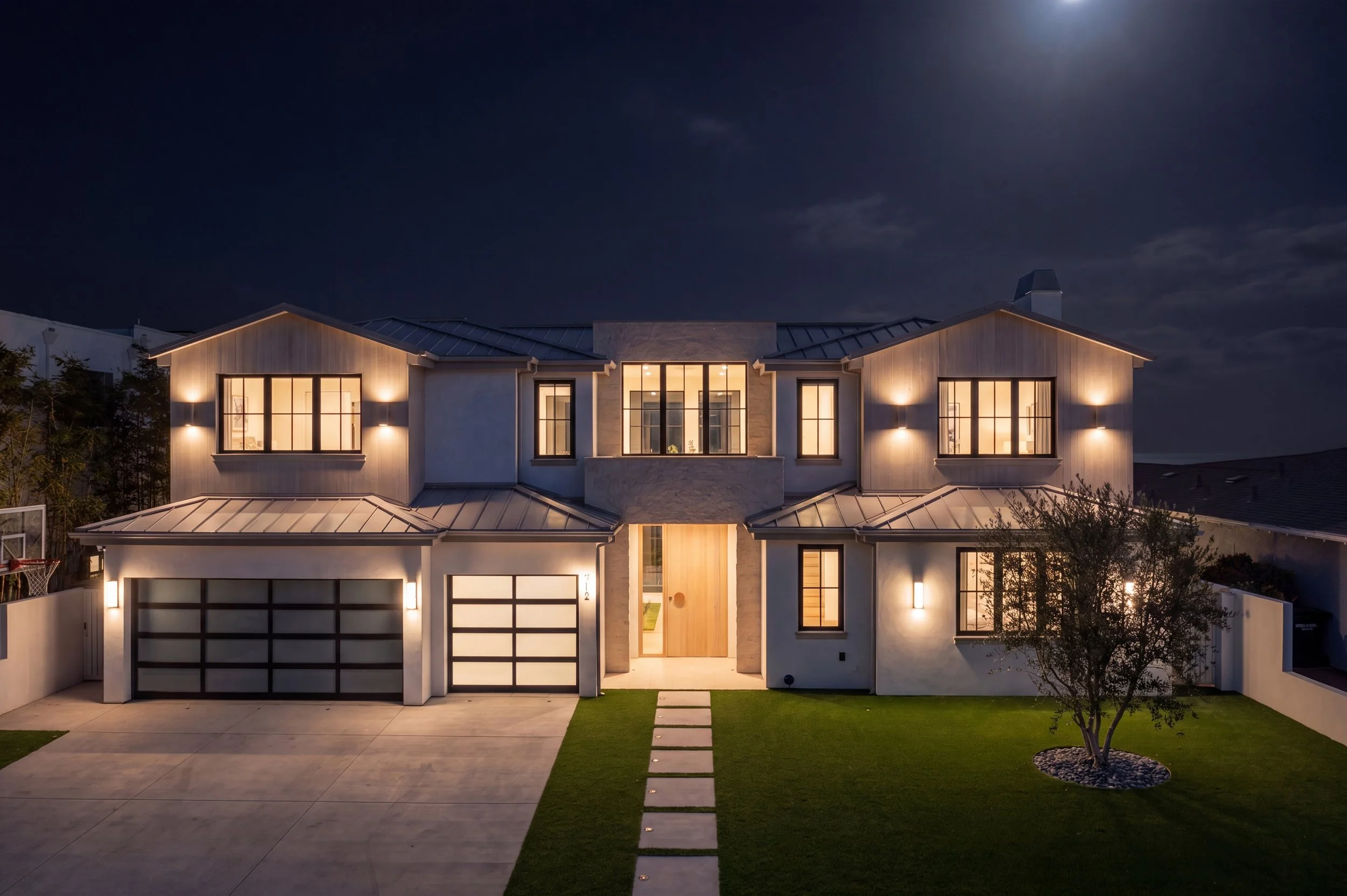 Architectural photography of a new-construction modern farmhouse on Marlita Place in Hermosa Beach, with ocean views. Daylight, golden-hour, and twilight coverage by iPhotographyHomes.