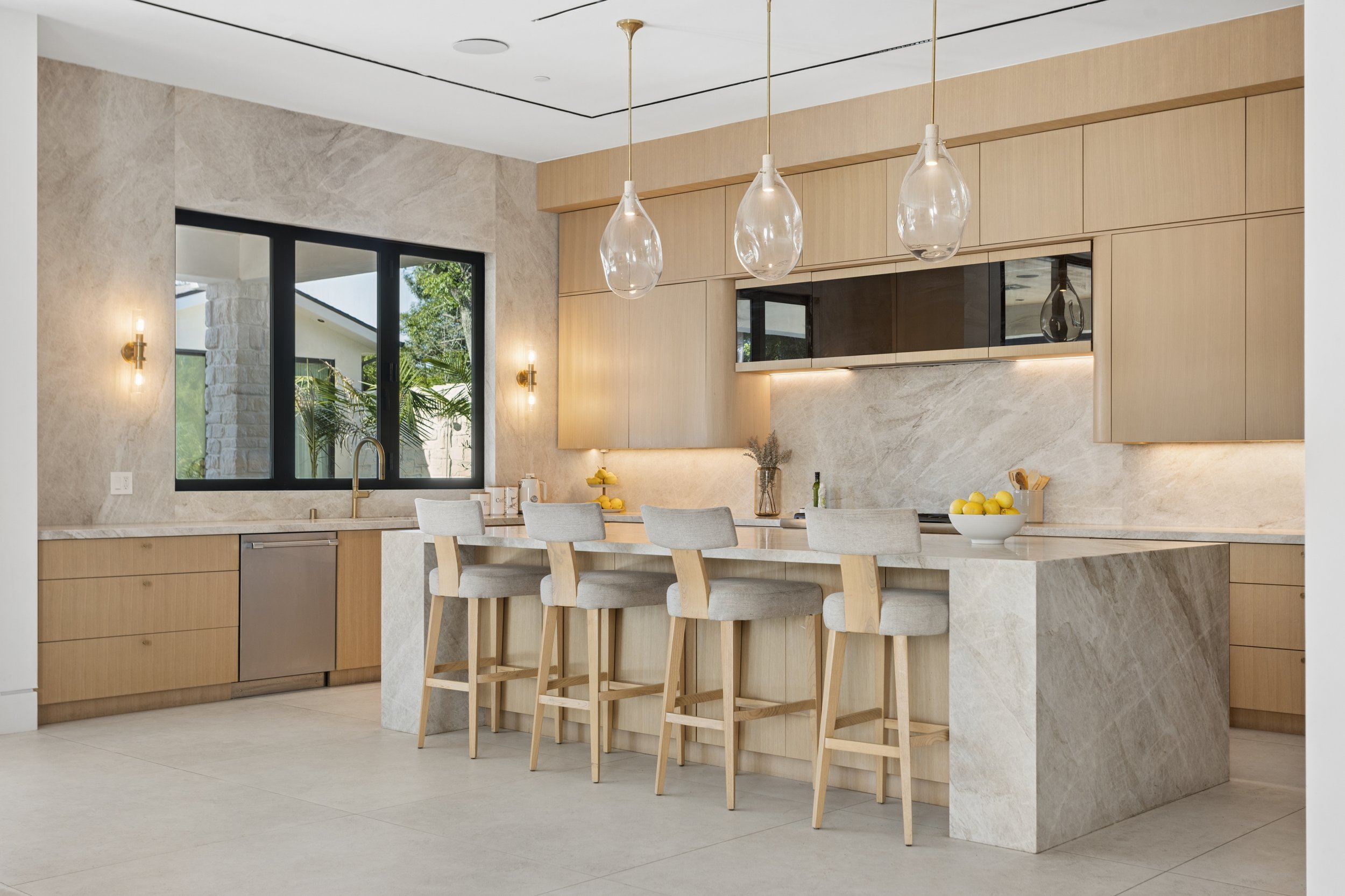 woodland-hills-luxury-kitchen-marble-waterfall-island.jpg