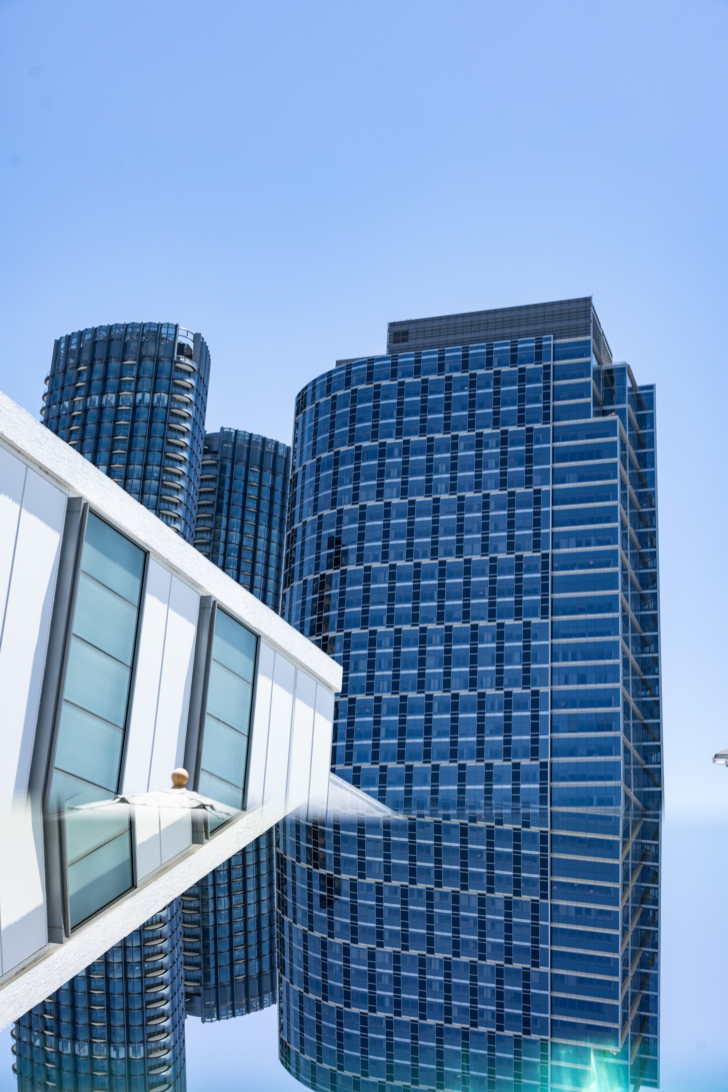 05-mirrored-cylindrical-tower-jutting-glass-form-century-city-los-angeles-linda-kasian.jpg