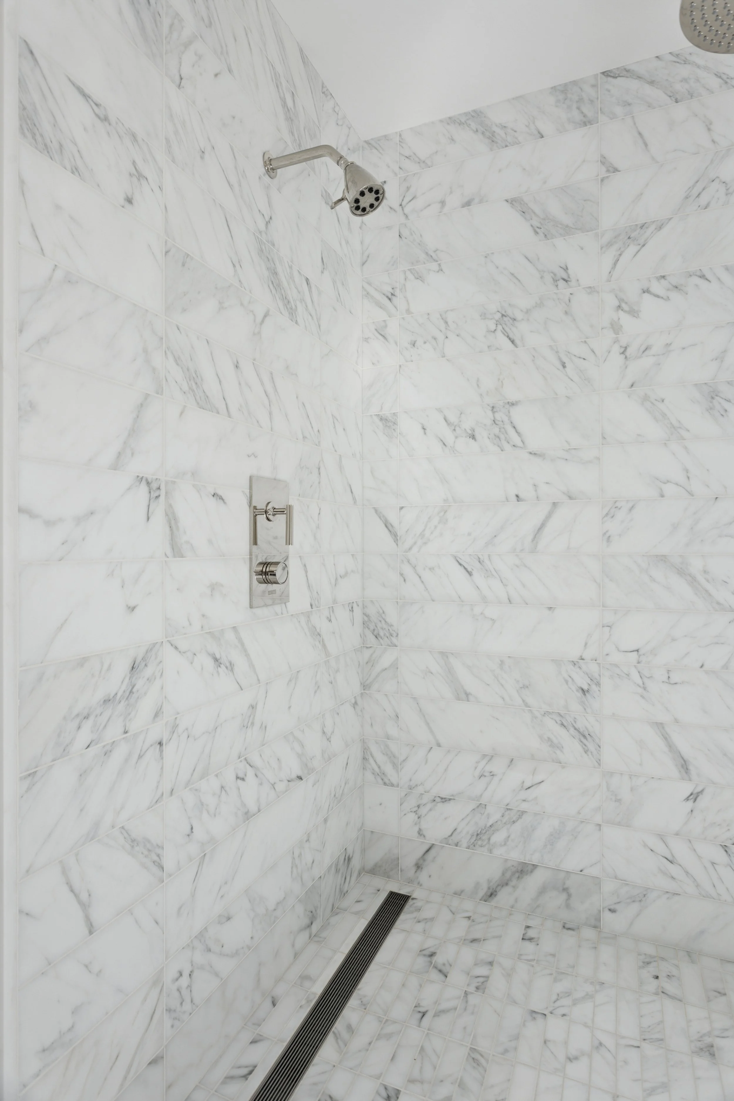 beverly-hills-luxury-bathroom-carrara-marble-shower.jpg