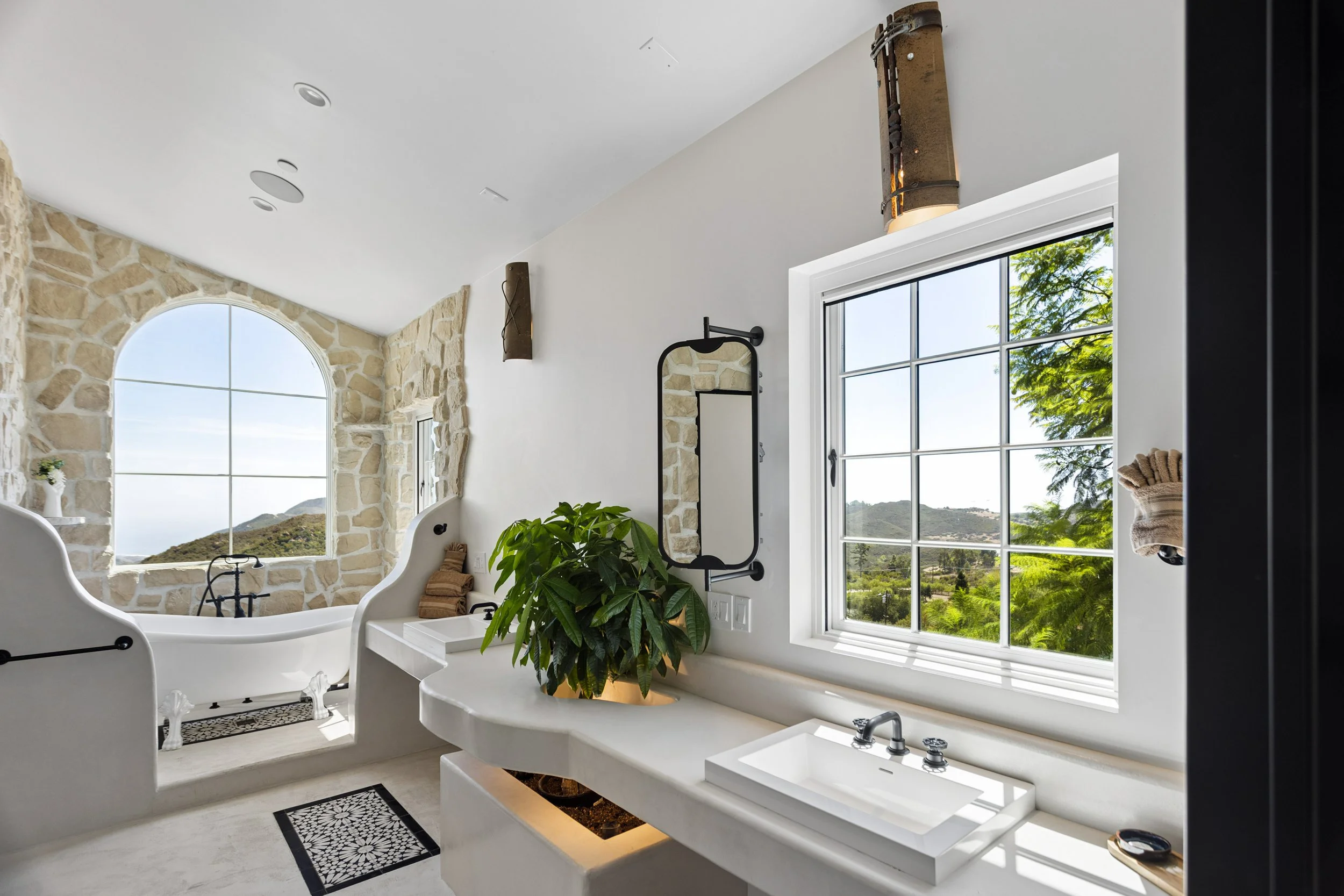 malibu-mediterranean-villa-spa-bath-arched-window-tub.jpg
