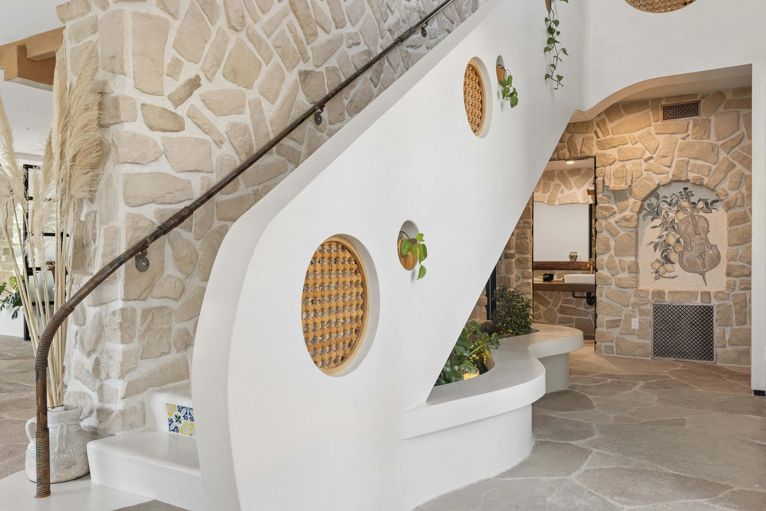malibu-mediterranean-villa-tiled-floating-staircase.jpg
