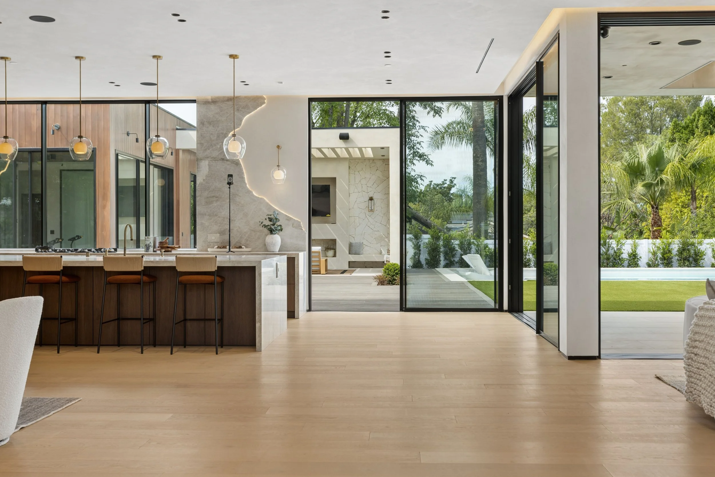 encino-modern-kitchen-marble-waterfall-sliding-doors.jpg