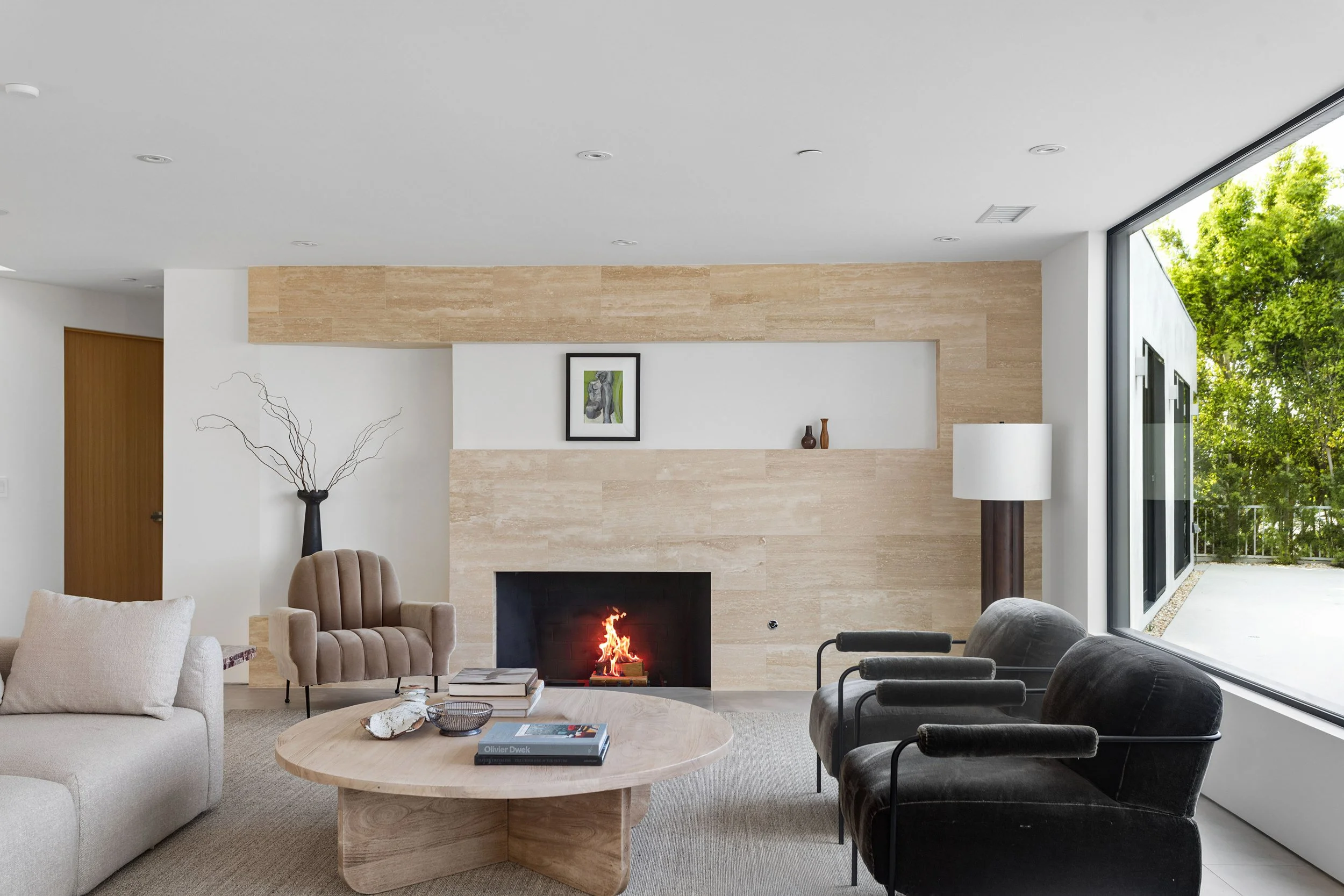 studio-city-modern-home-living-room-travertine-fireplace.jpg
