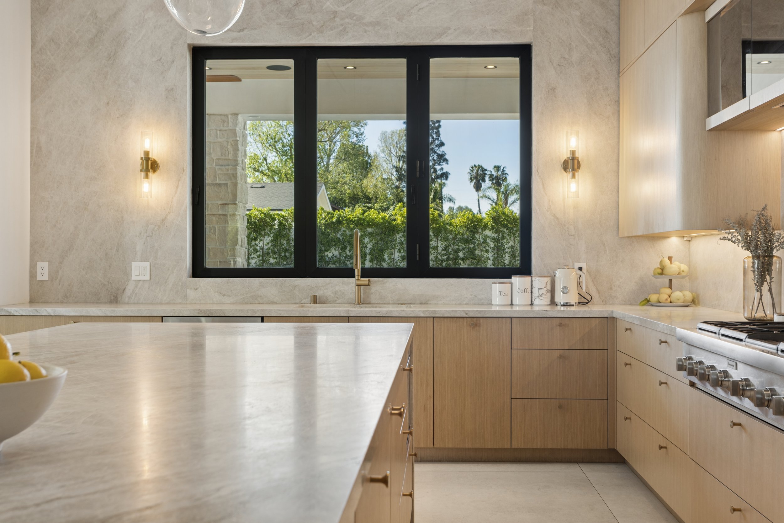 woodland-hills-luxury-kitchen-marble-counters-garden-window.jpg