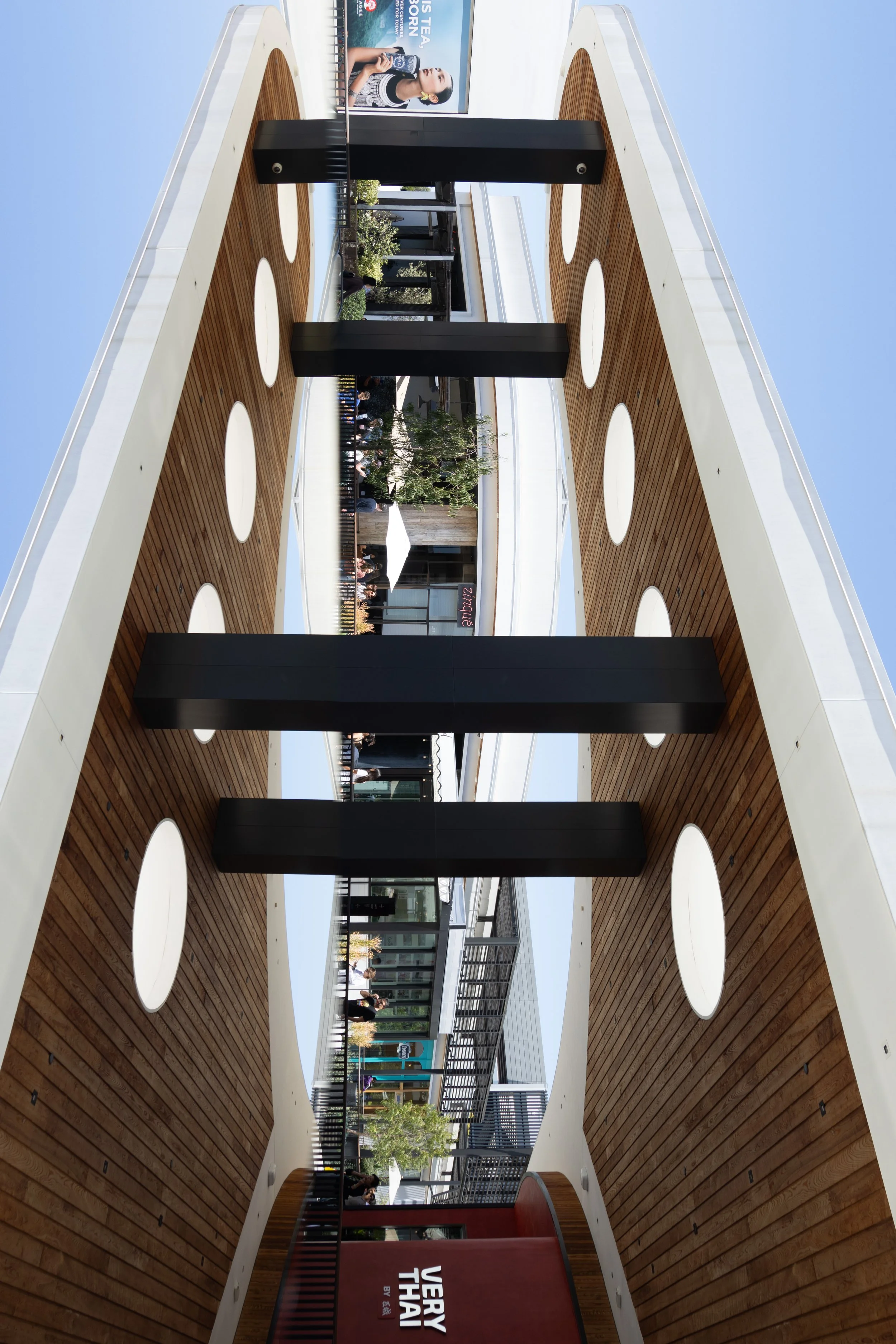 03-mirrored-wood-paneled-pyramid-passage-westfield-century-city-los-angeles-linda-kasian.jpg