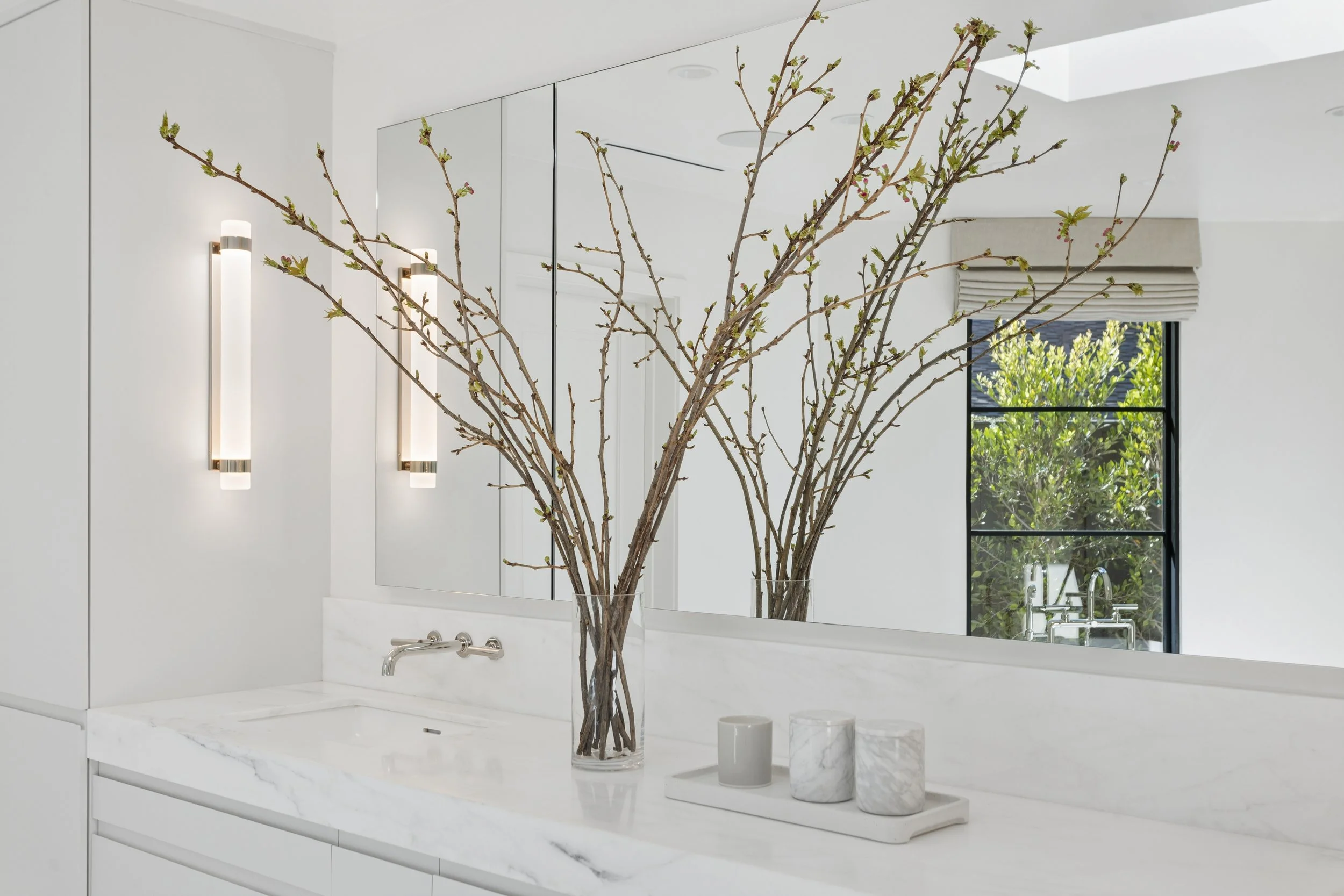 beverly-hills-luxury-bathroom-marble-vanity-fluted-sconces.jpg