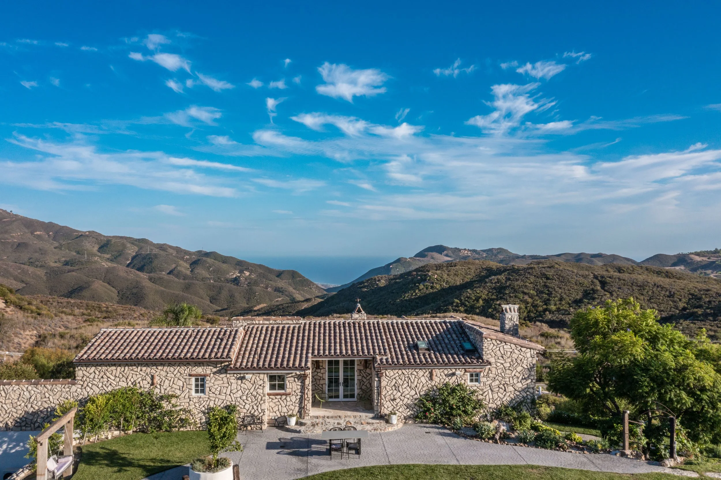 malibu-mediterranean-villa-hilltop-ocean-view-daytime.jpg