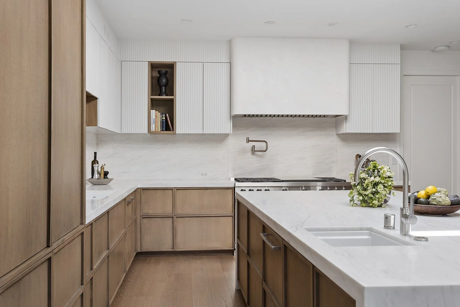 beverly-hills-luxury-kitchen-marble-hood-oak-cabinets.jpg