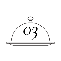 A cloche serving cover placed over a plate