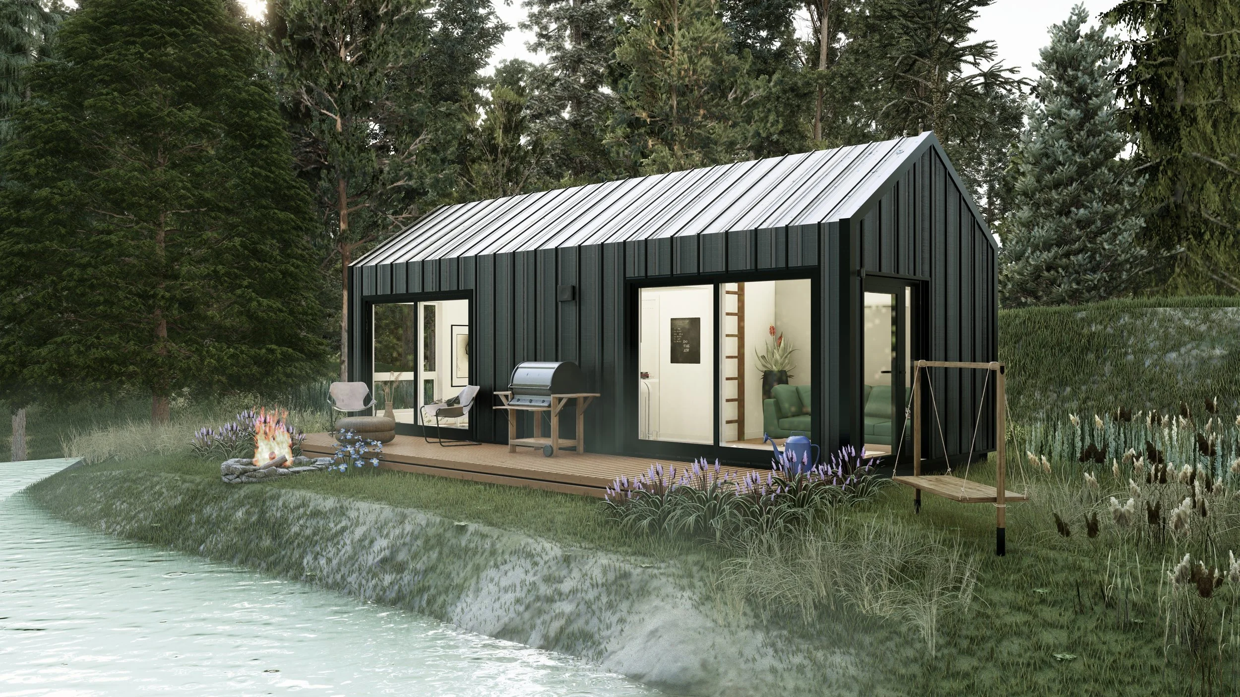 A modern tiny house with black siding and a metal roof, situated near a pond with greenery and trees in the background, featuring an outdoor patio with chairs, a grill, and a fire pit.
