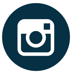 Instagram logo in dark blue on a black circular background.