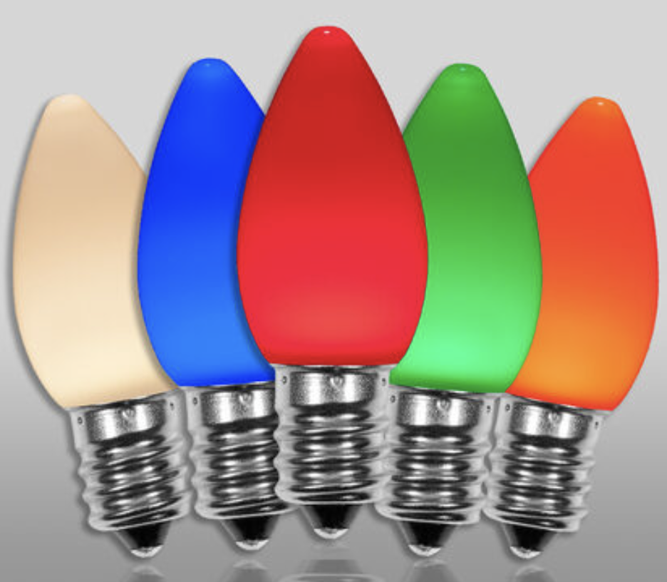Colorful LED Christmas lights in red, green, blue, orange, and beige on a gray background.