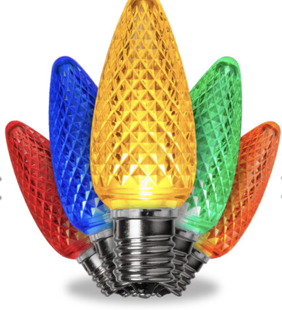 A set of five colorful Christmas lights in red, blue, yellow, green, and orange with faceted surfaces, attached to metallic bases.