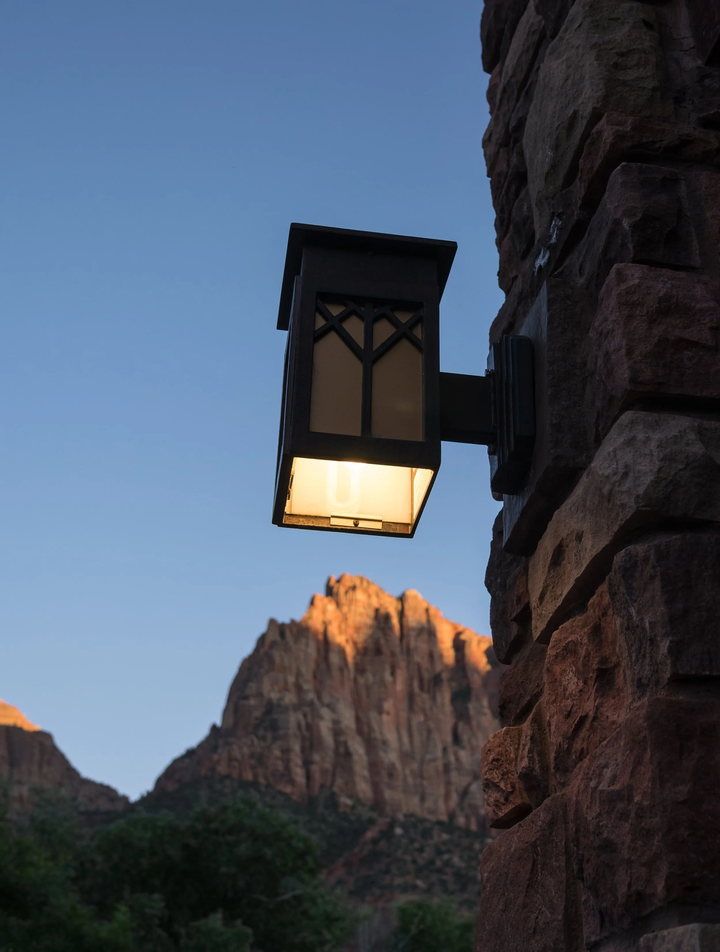 Wall sconce and Alpenglow, Springdale, Utah