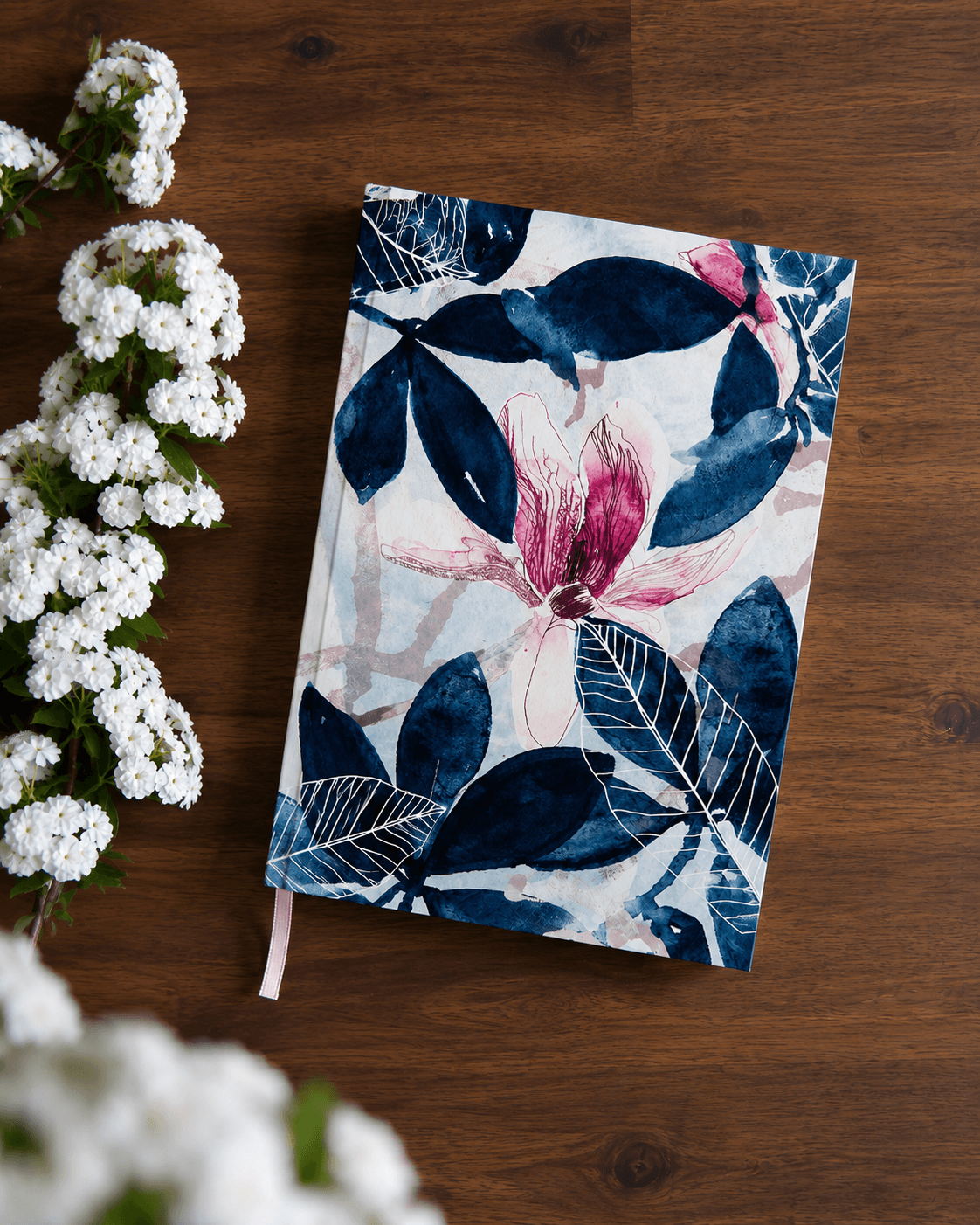 Hand-painted magnolia botanical illustration used for journal cover design in soft watercolour tones.