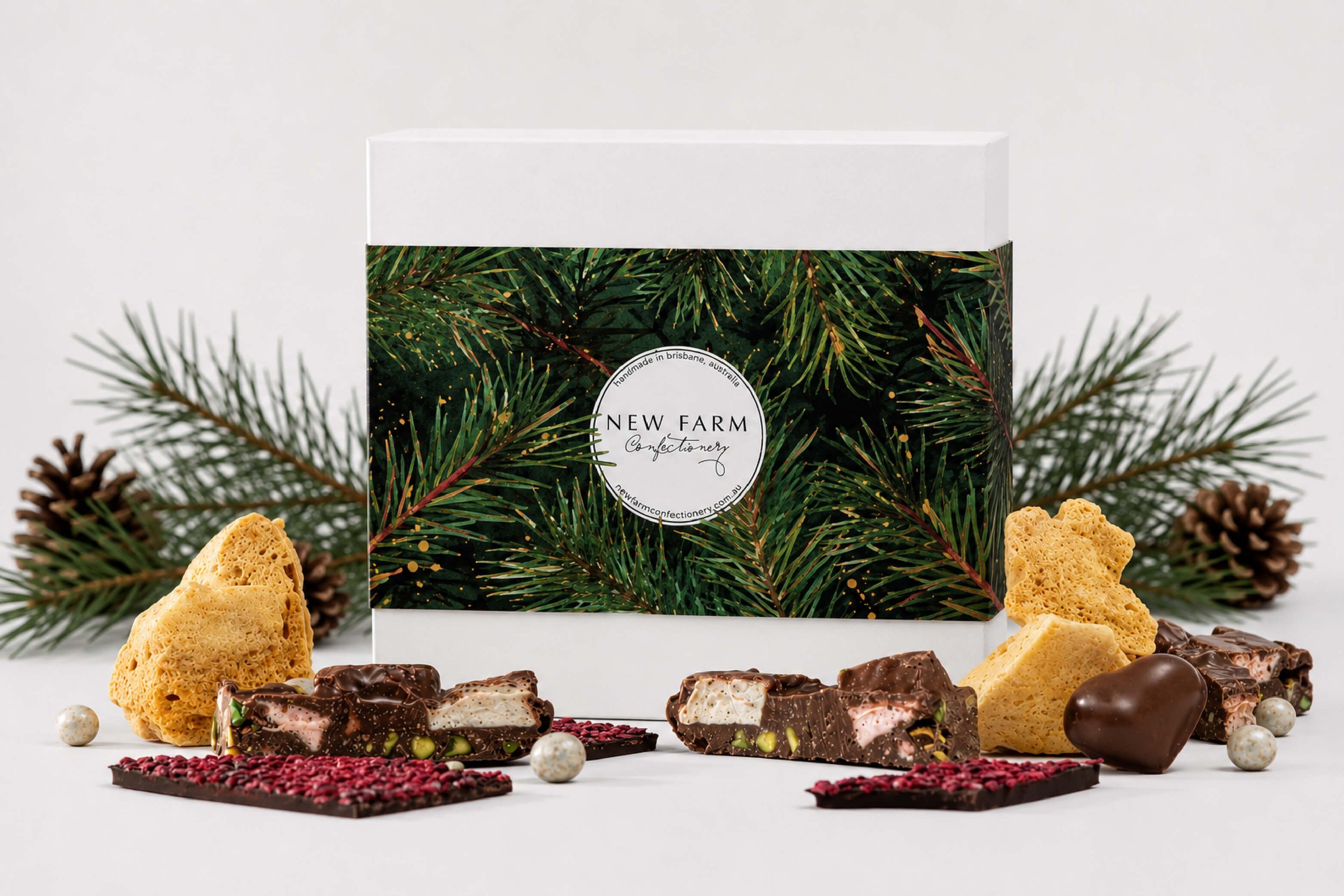 Festive illustration, surface pattern design, and seasonal retail styling created for New Farm Confectionery Christmas packaging and gifting.