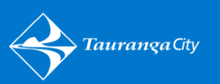 Tauranga City logo on a blue background