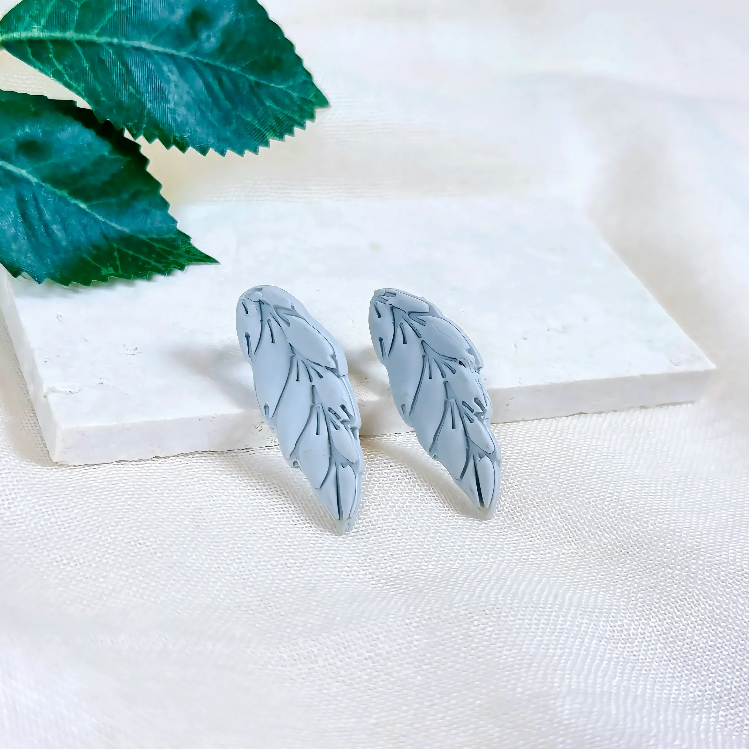 paloma-clay-gray-leaf-stud-earrings-alt.jpeg