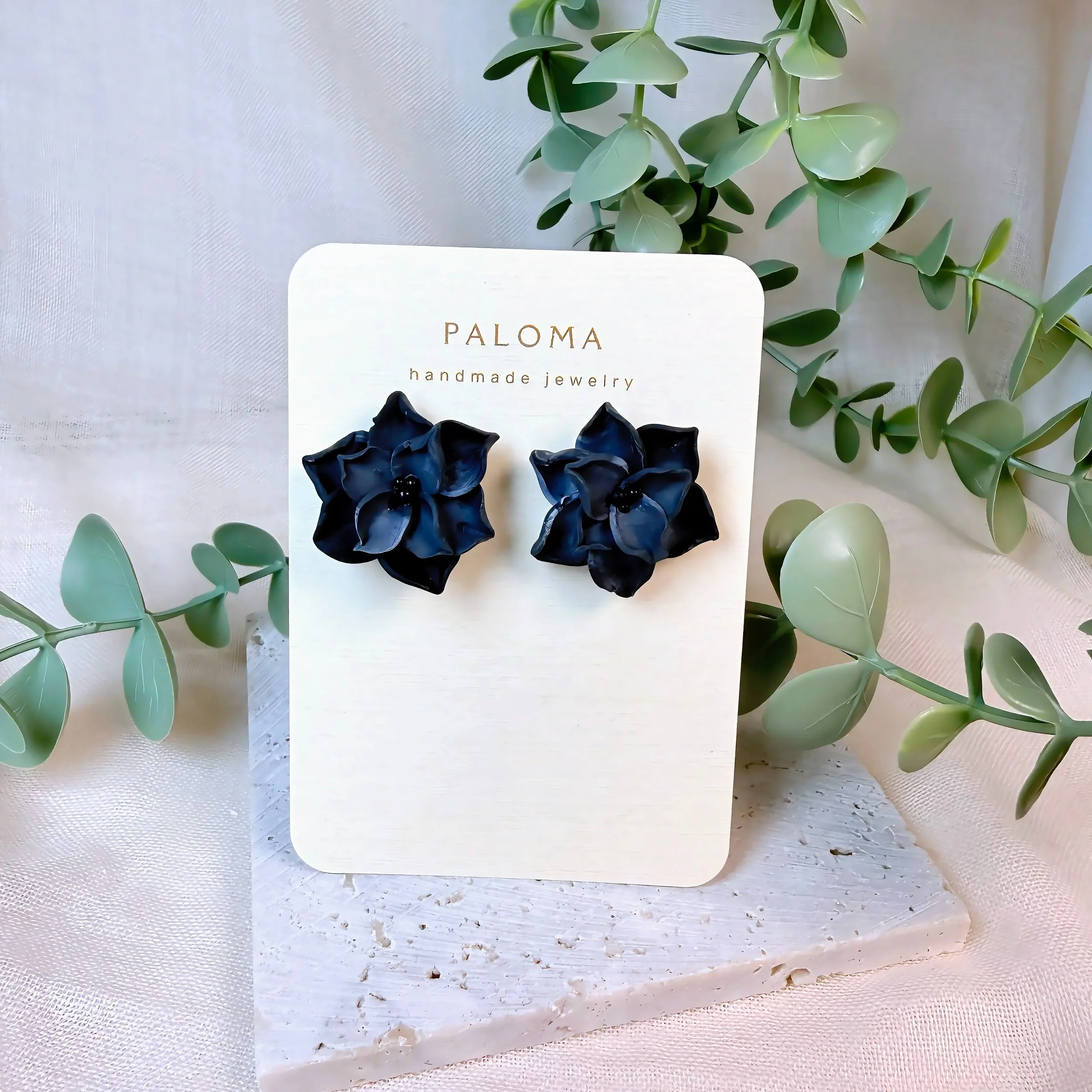 paloma-clay-navy-star-flower-stud-earrings-card.jpeg