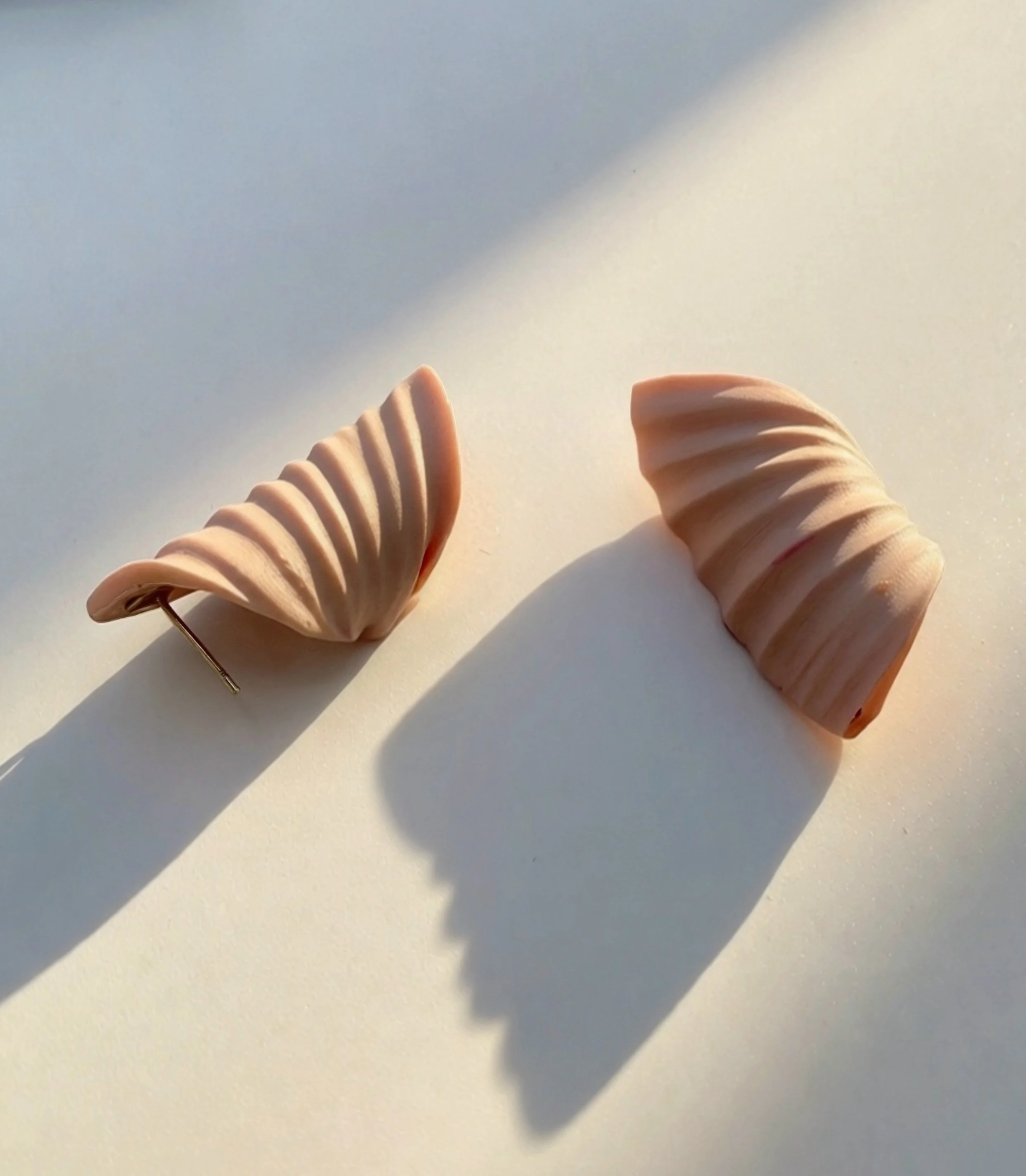 paloma-clay-swirled-ribbon-shell-stud-earrings.jpeg