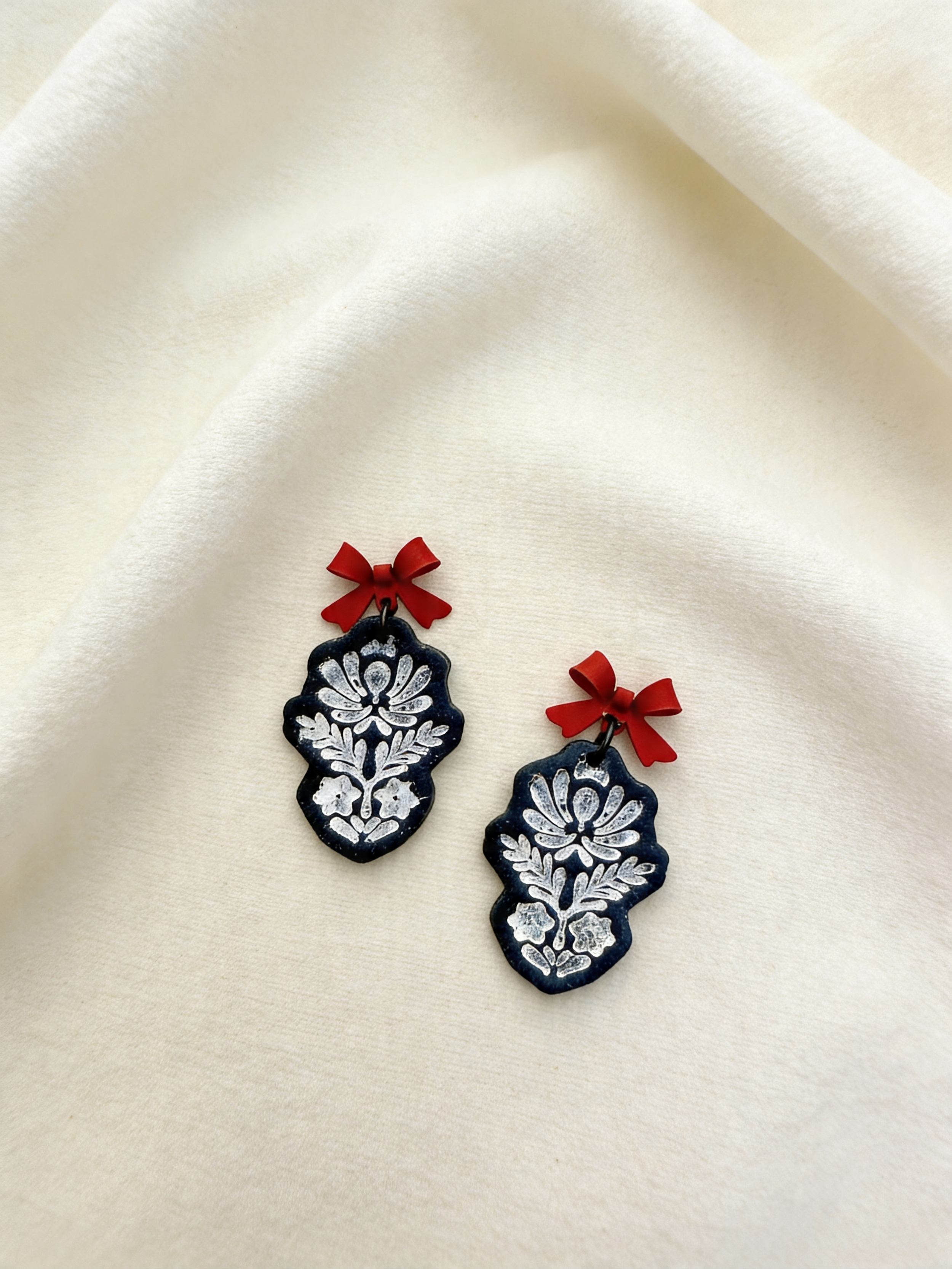 paloma-clay-white-floral-damask-red-bow-earrings.png
