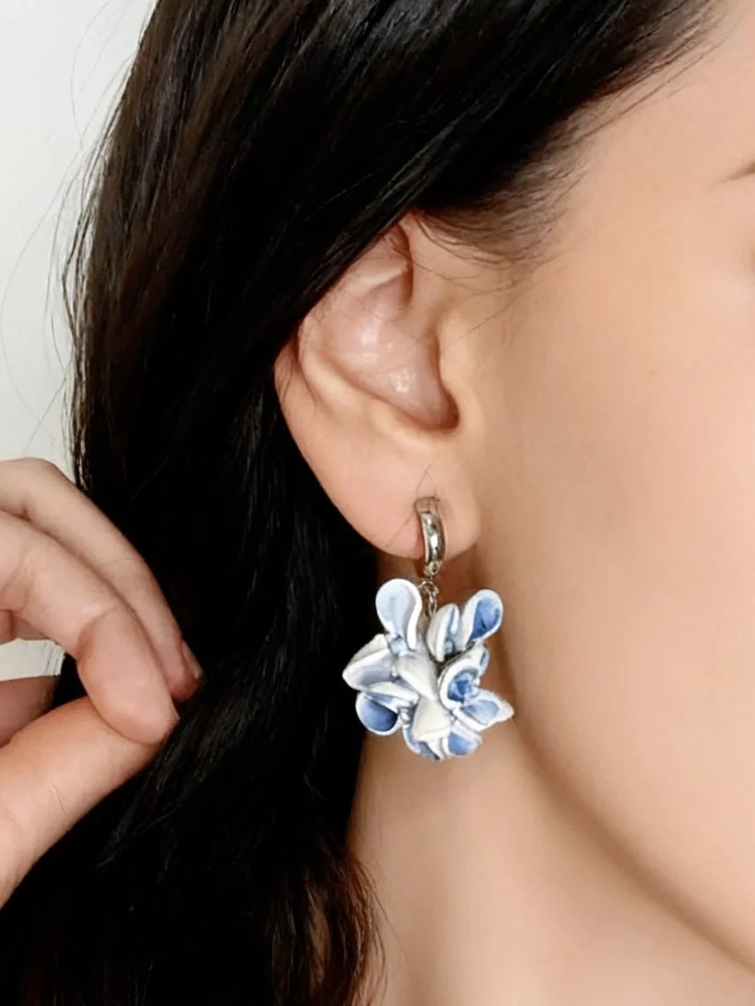 Paloma_Clay_Earrings_Flower_Dangle_Blue_Model.jpg