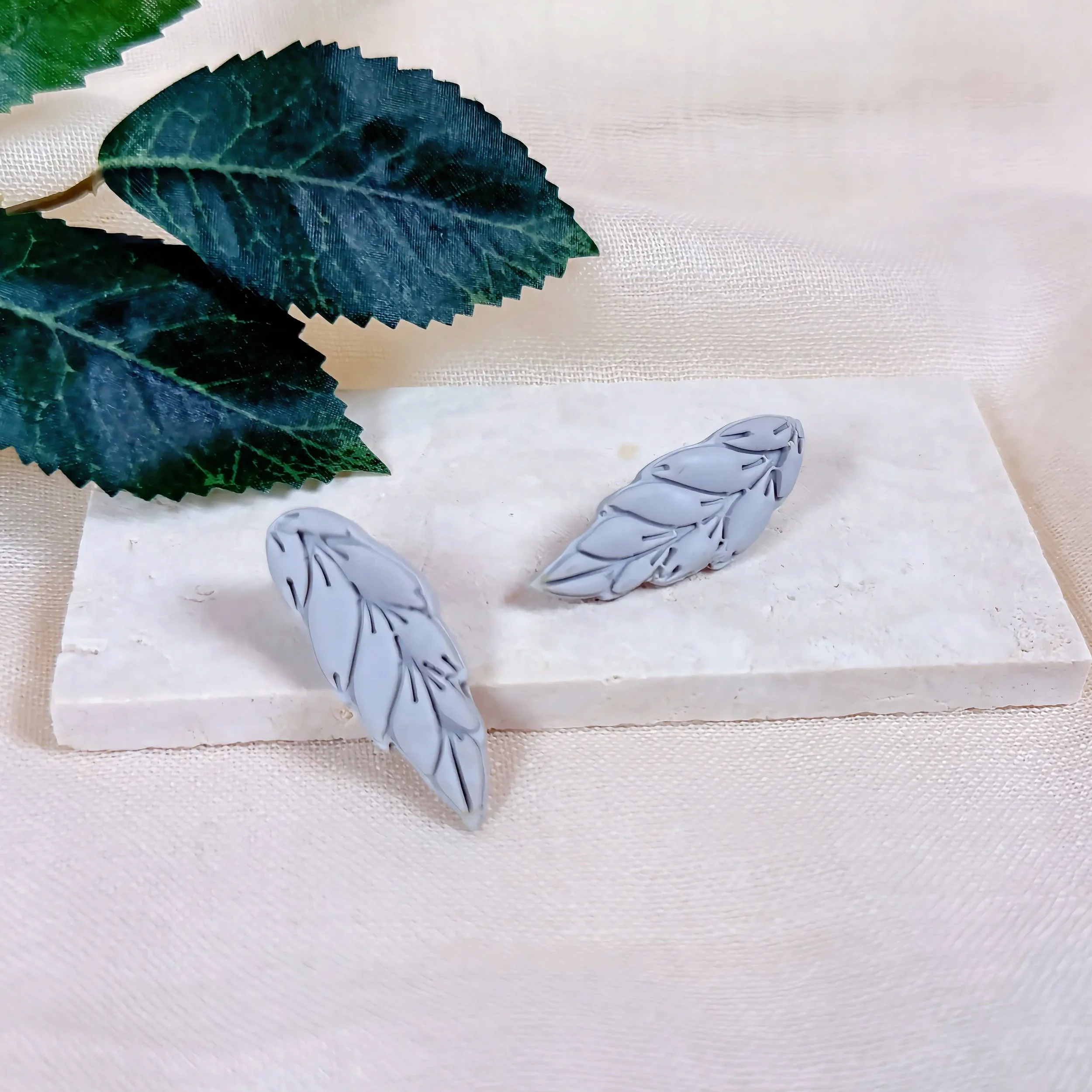 paloma-clay-gray-leaf-stud-earrings.jpeg