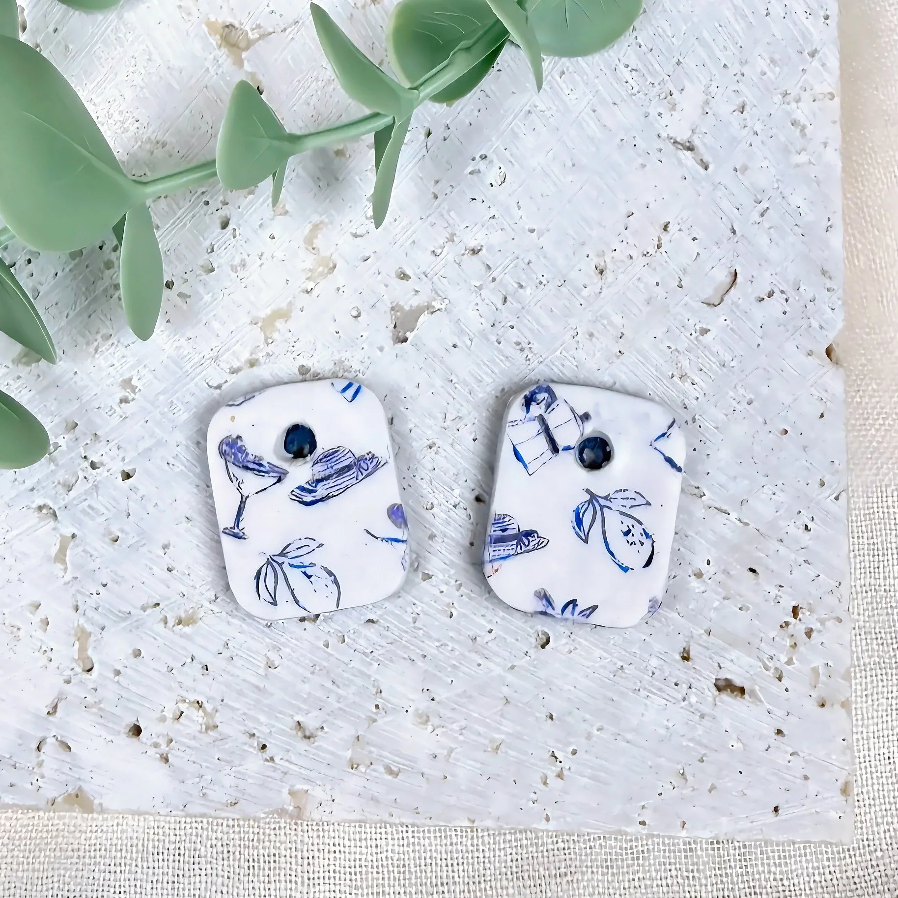 paloma-clay-navy-floral-rounded-square-stud-earrings-alt.jpeg