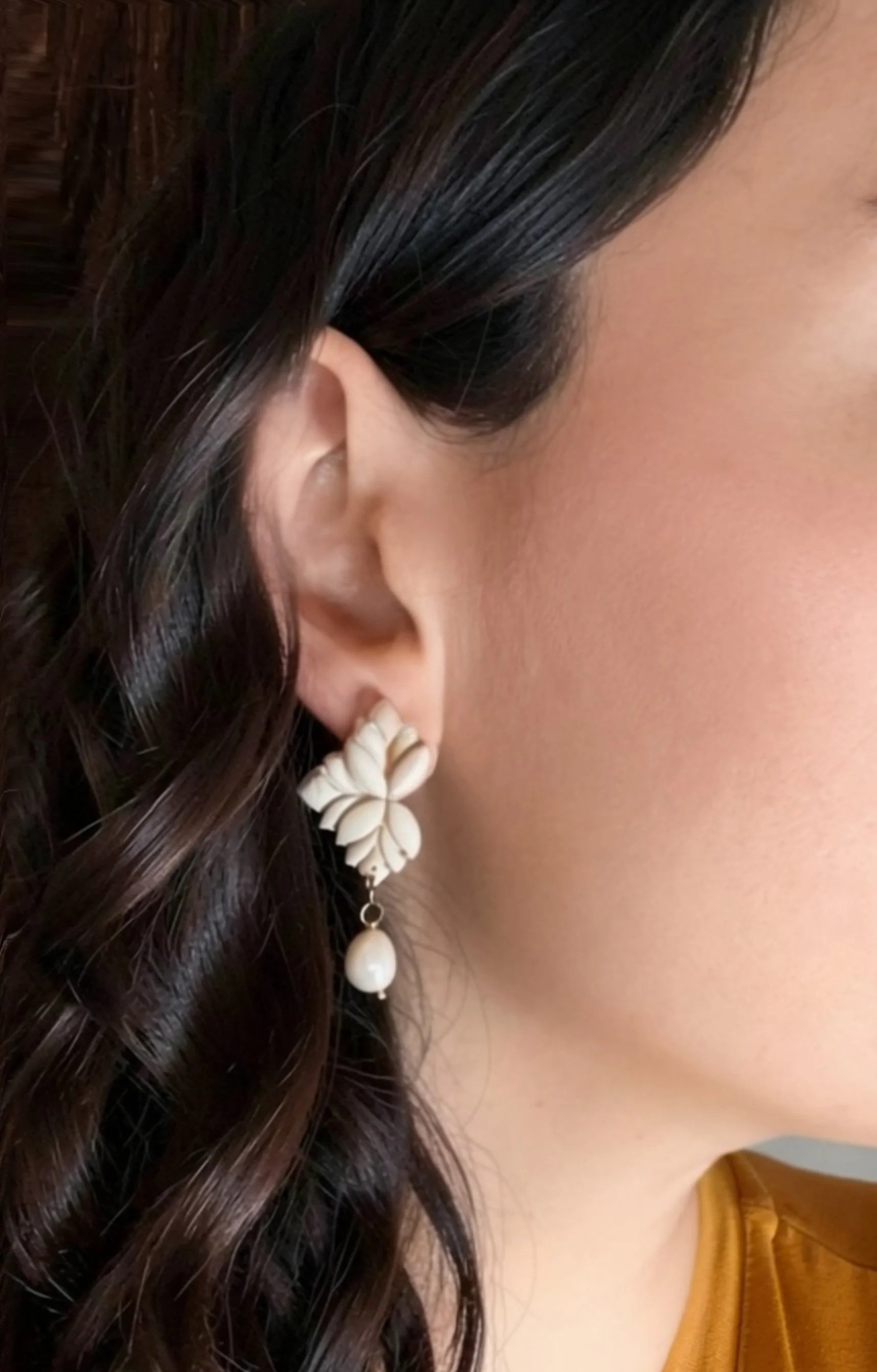 paloma-clay-model-wearing-white-flower-dangle-earrings.jpg
