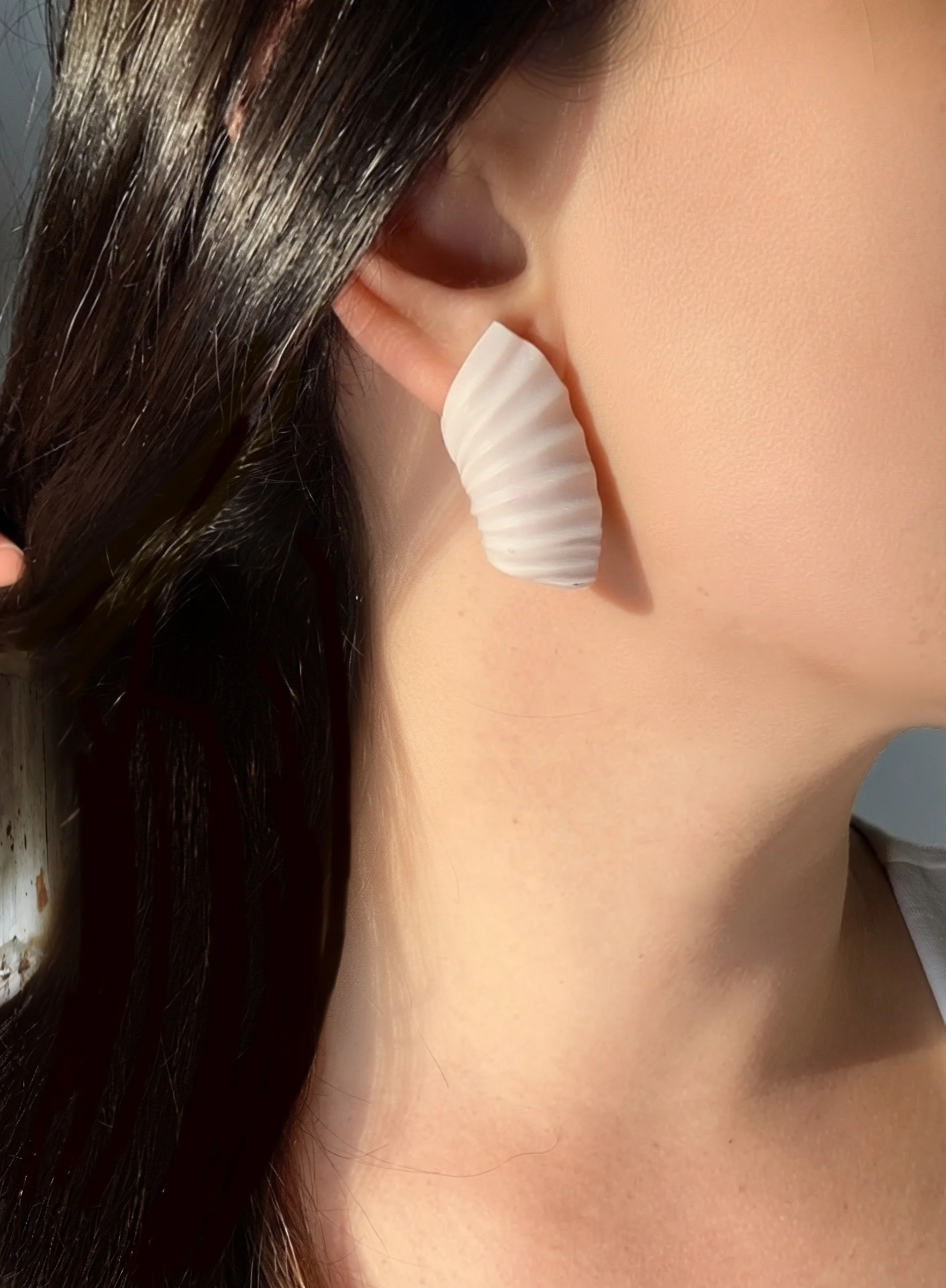paloma-clay-model-wearing-blush-shell-stud-earring.jpeg