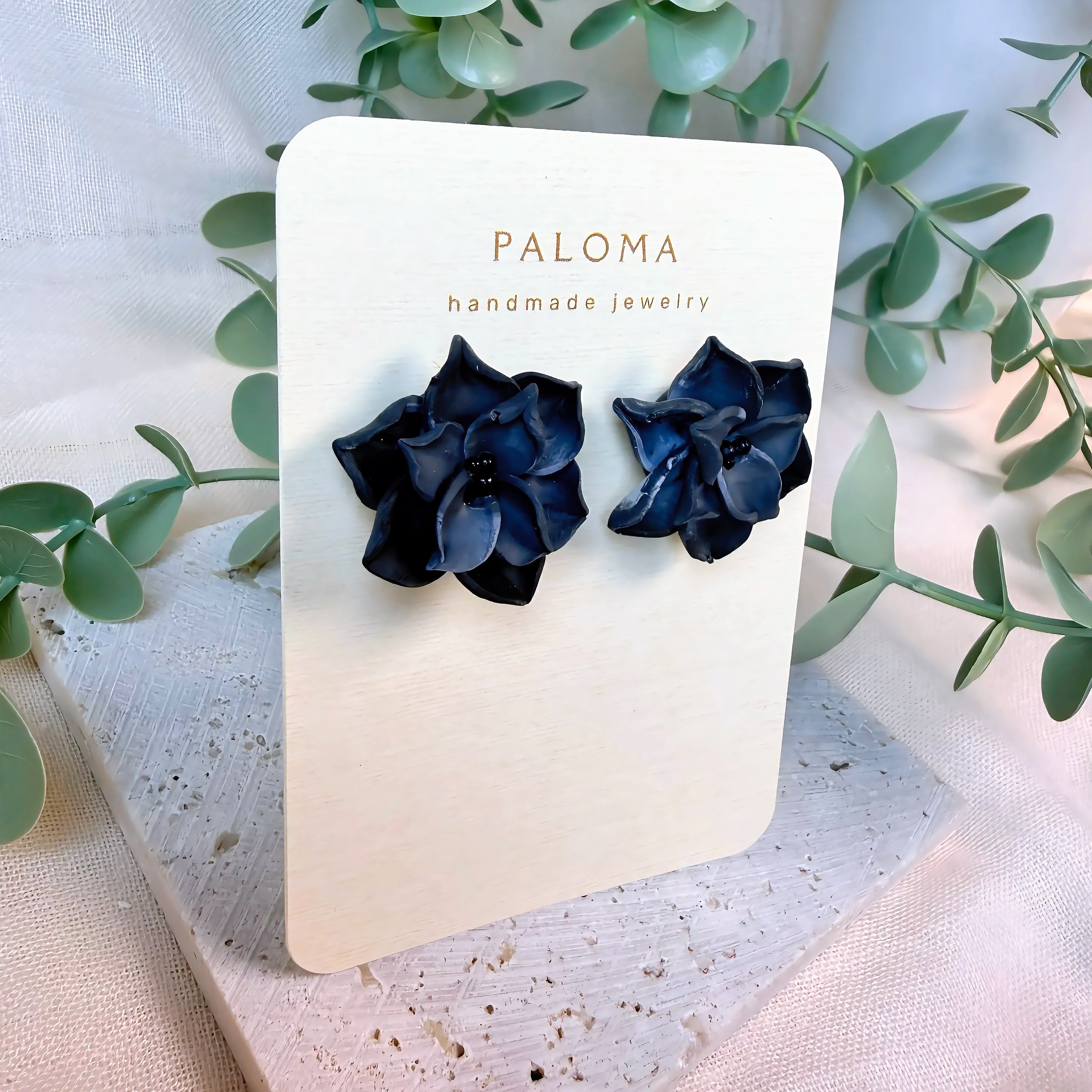 paloma-clay-navy-ruffled-flower-stud-earrings-card.jpeg