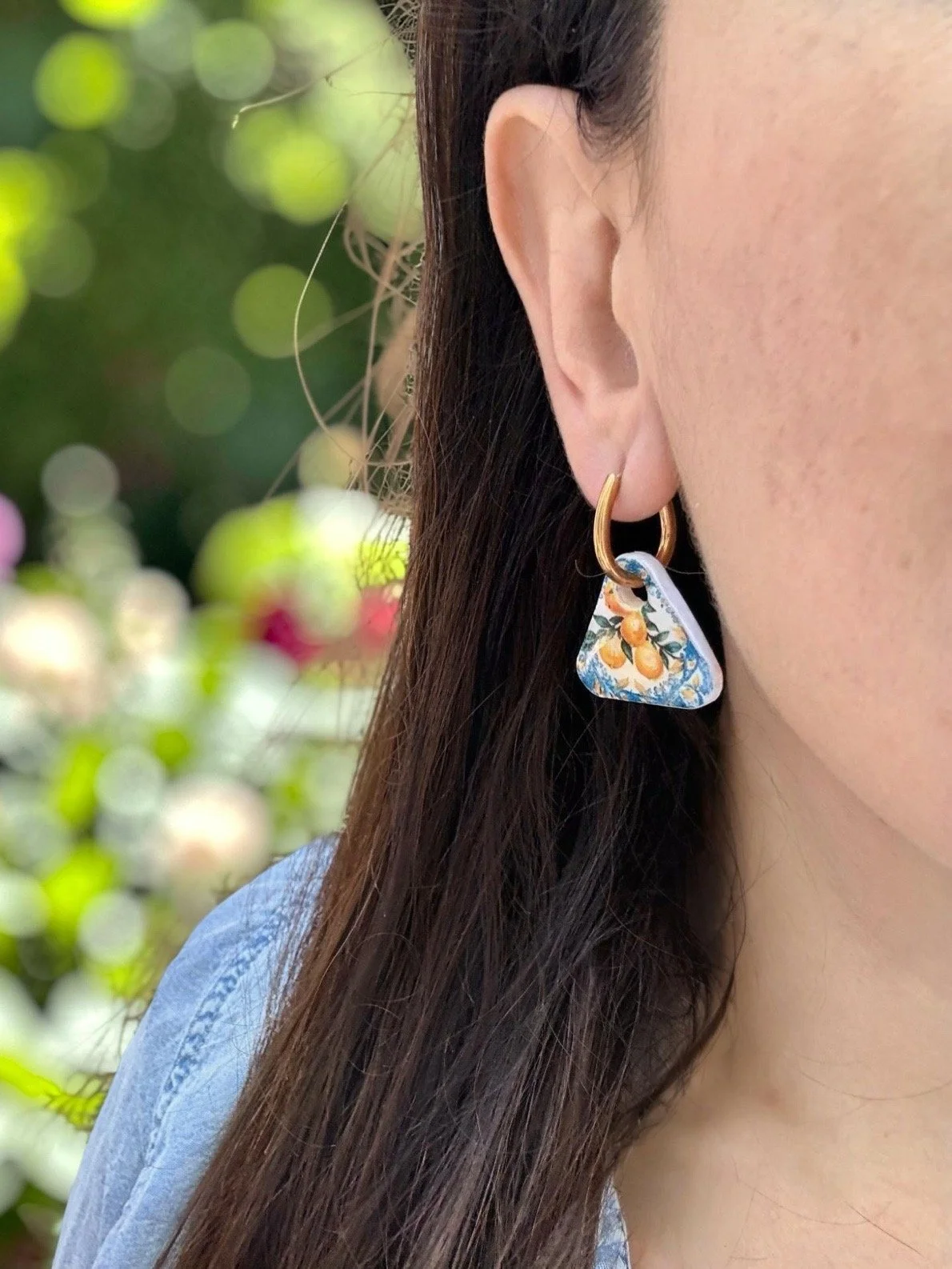 paloma-clay-model-wearing-colorful-triangle-stud-earring-outdoor.jpg
