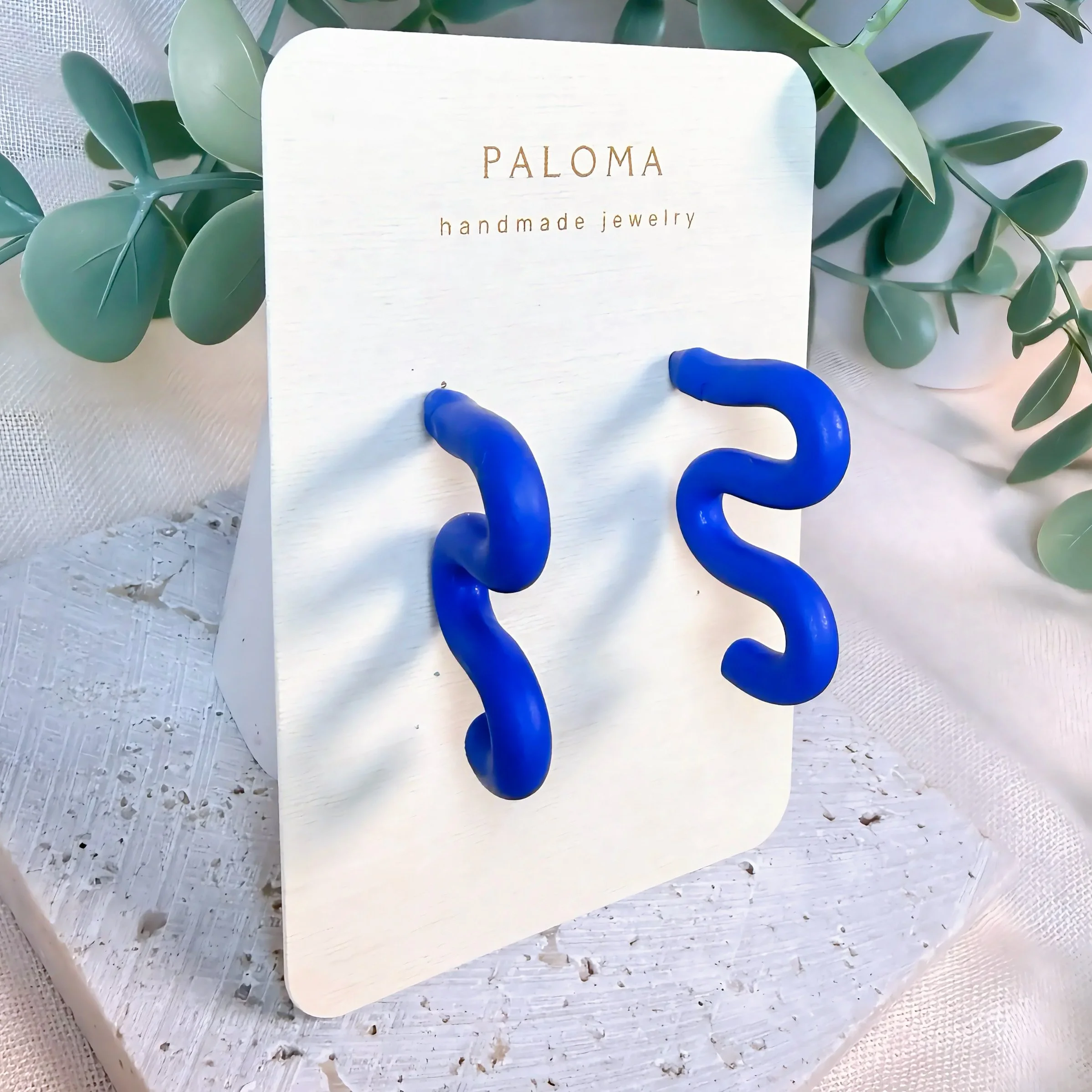 paloma-clay-blue-squiggle-wave-stud-earrings-card.jpeg