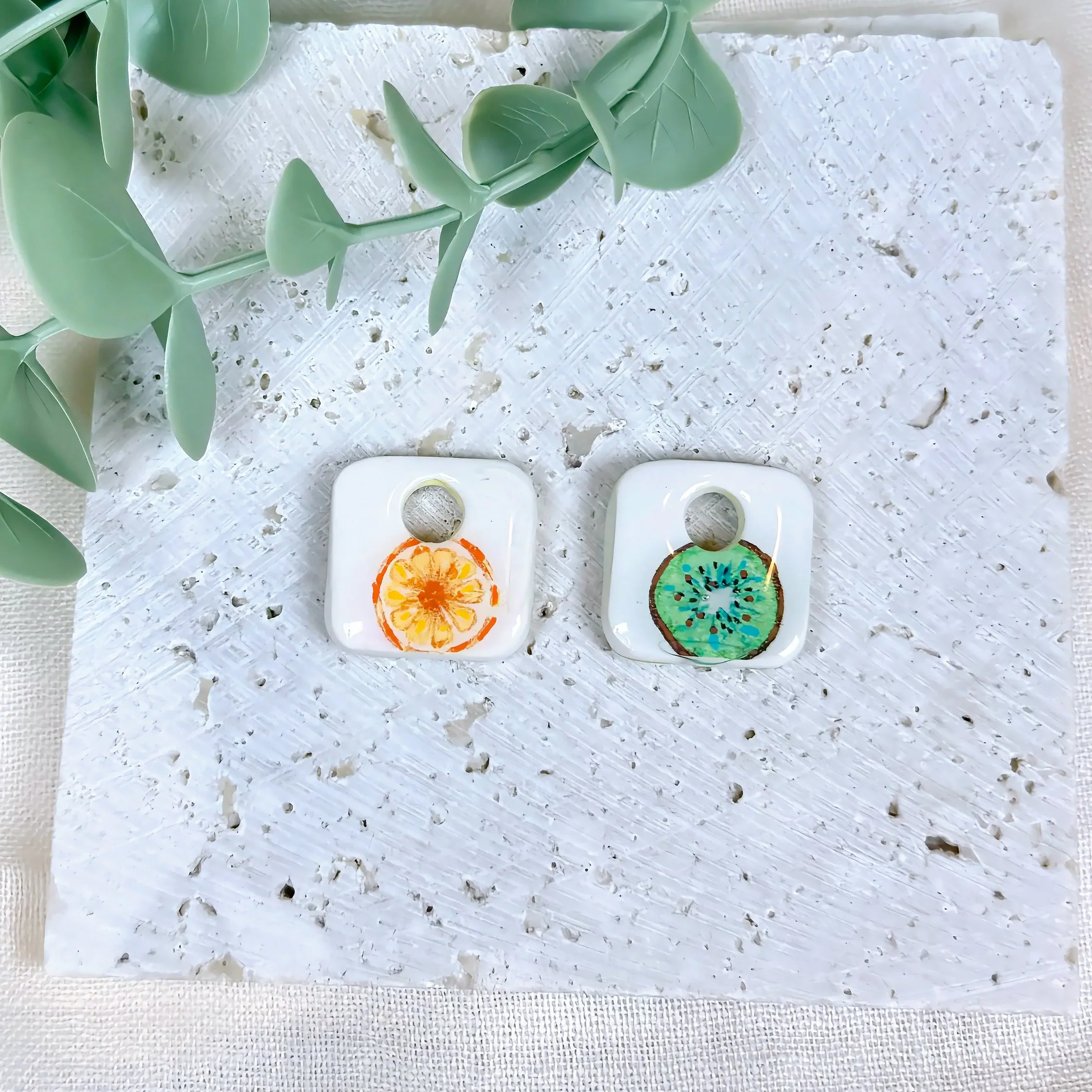 paloma-clay-orange-green-citrus-slice-stud-earrings.jpeg