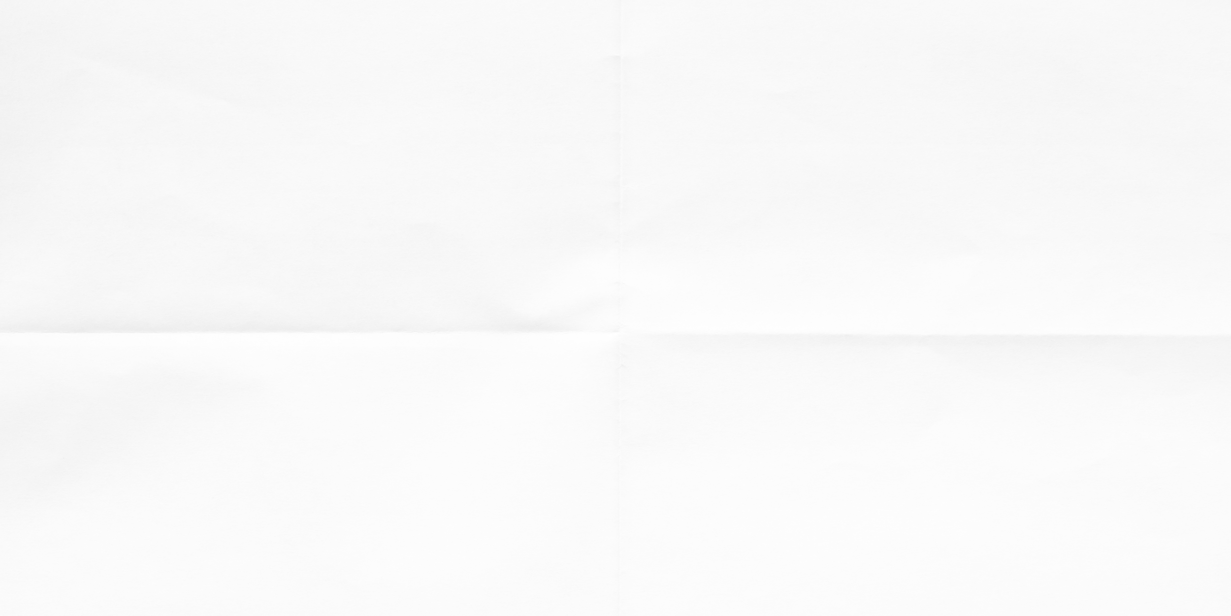 A crumpled sheet of white paper with visible folds and creases.
