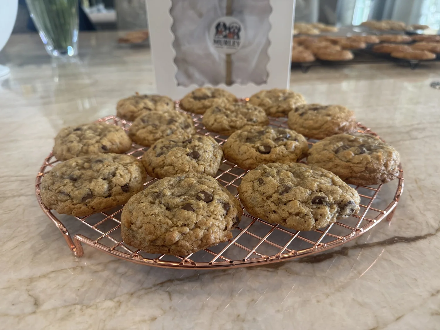 Fresh-baked Murley cookies cooling on a copper rack