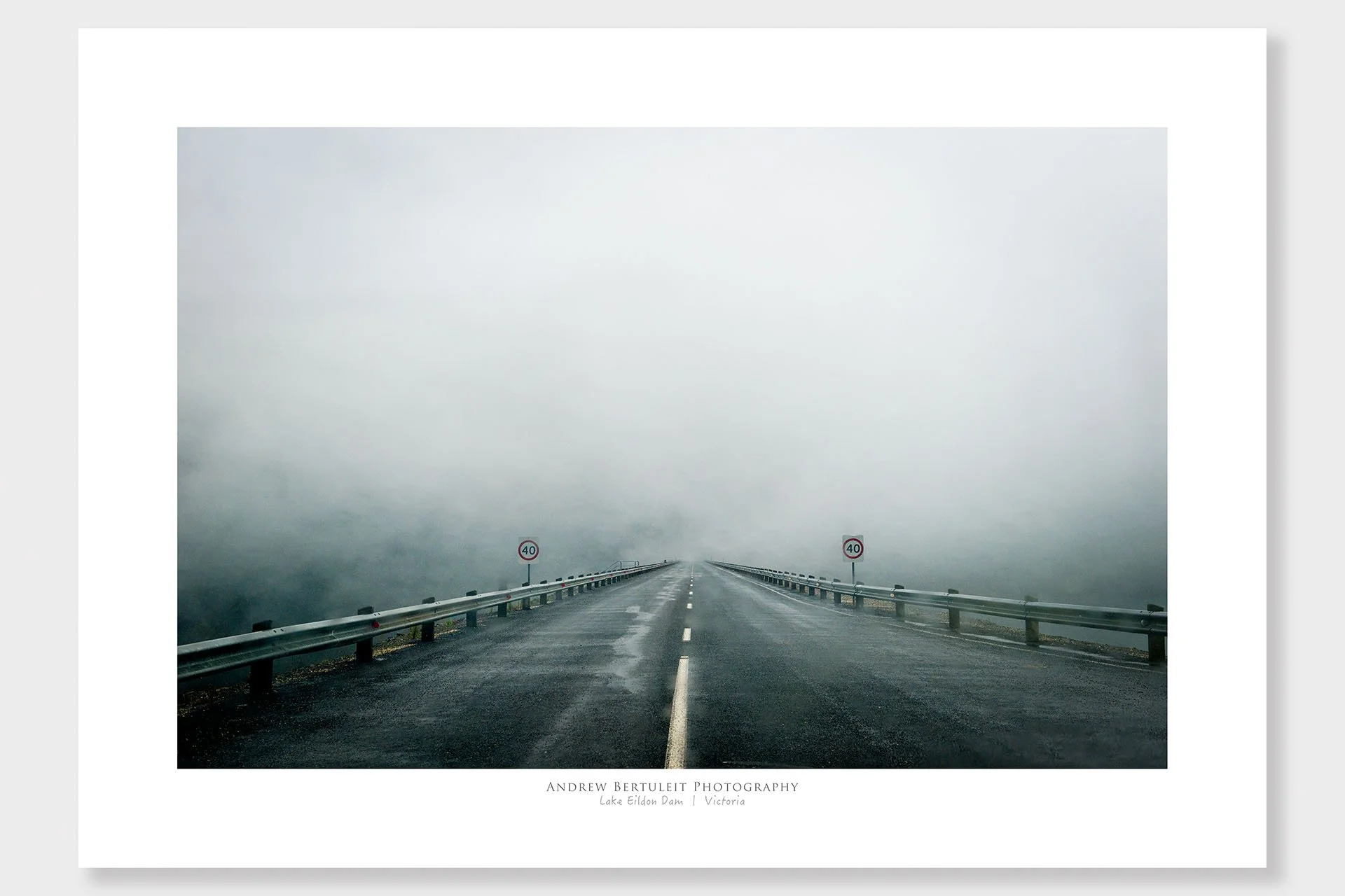 Lake Eildon road into the fog print with white border, ready for a standard frame.