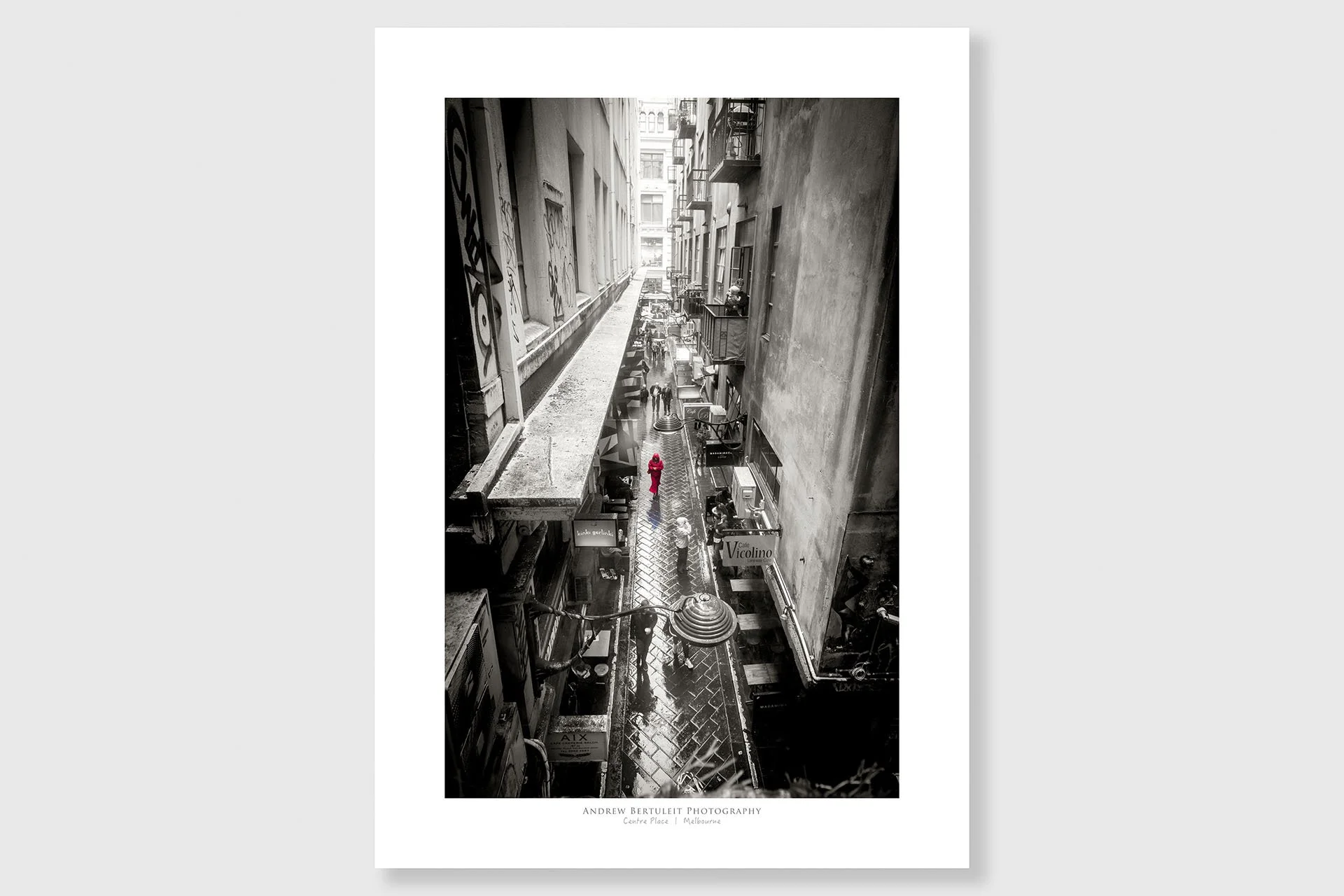 Centre Place Melbourne lady in red print with white border, ready for a standard frame.